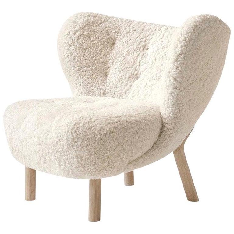 Scandinavian Modern Little Petra Lounge Chair & Ottoman in Sheepskin with oiled Oak Frame For Sale