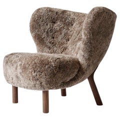 Little Petra VB1, in Sheepskin Sahara & Walnut by Viggo Boesen for & Tradition