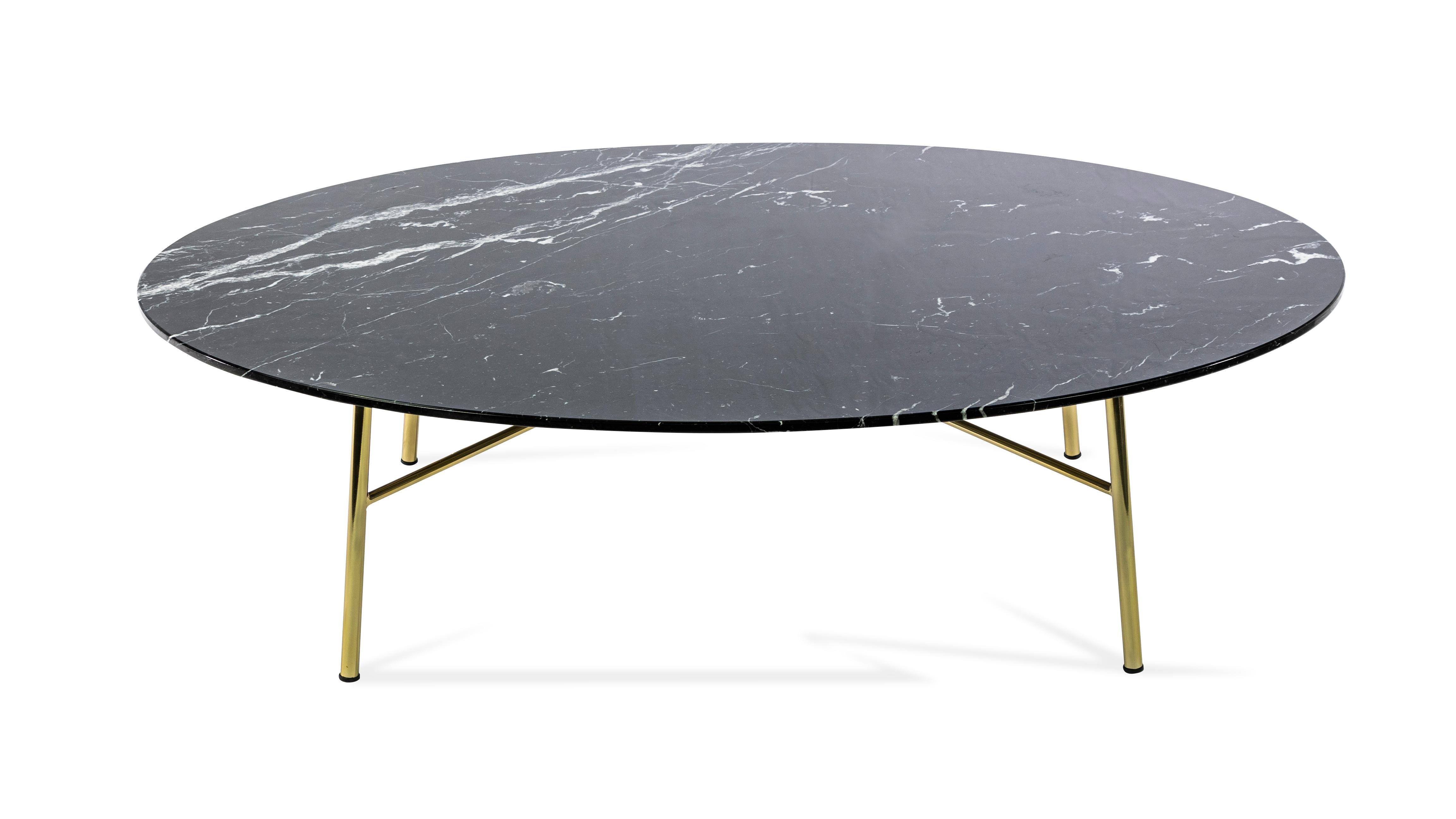 Coffee table, with metal frame, painted in standard or special colors, top available in glass ceramic color black Marquinia marble oval 110 x 76 cm.
It fits perfectly in a hotel lounge or home environment.