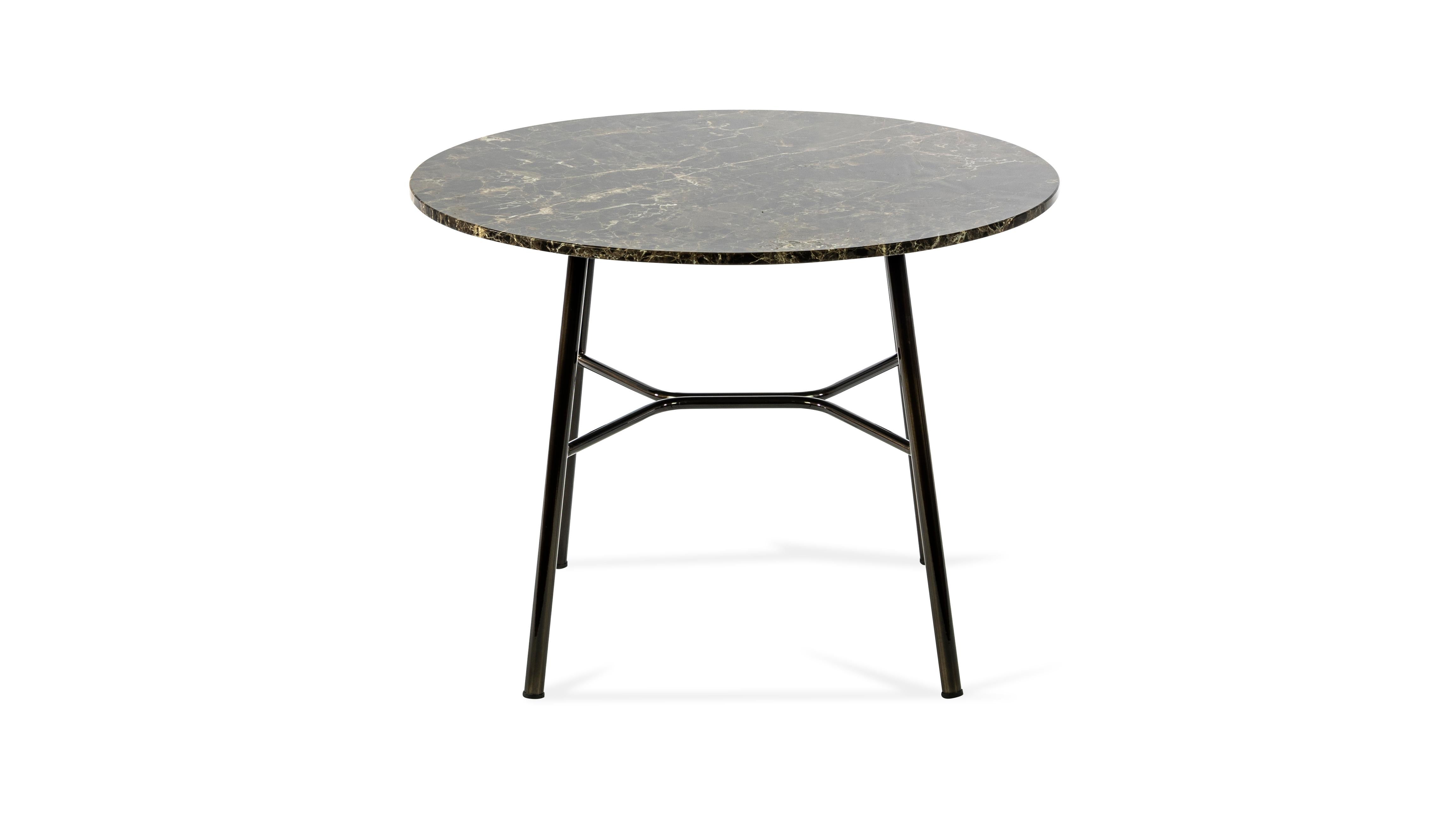 Coffee table, with metal frame, painted in standard or special colors, top available in glass ceramic color brown Emperador marble diameter 50 cm, height 45
It fits perfectly in a hotel lounge or home environment.