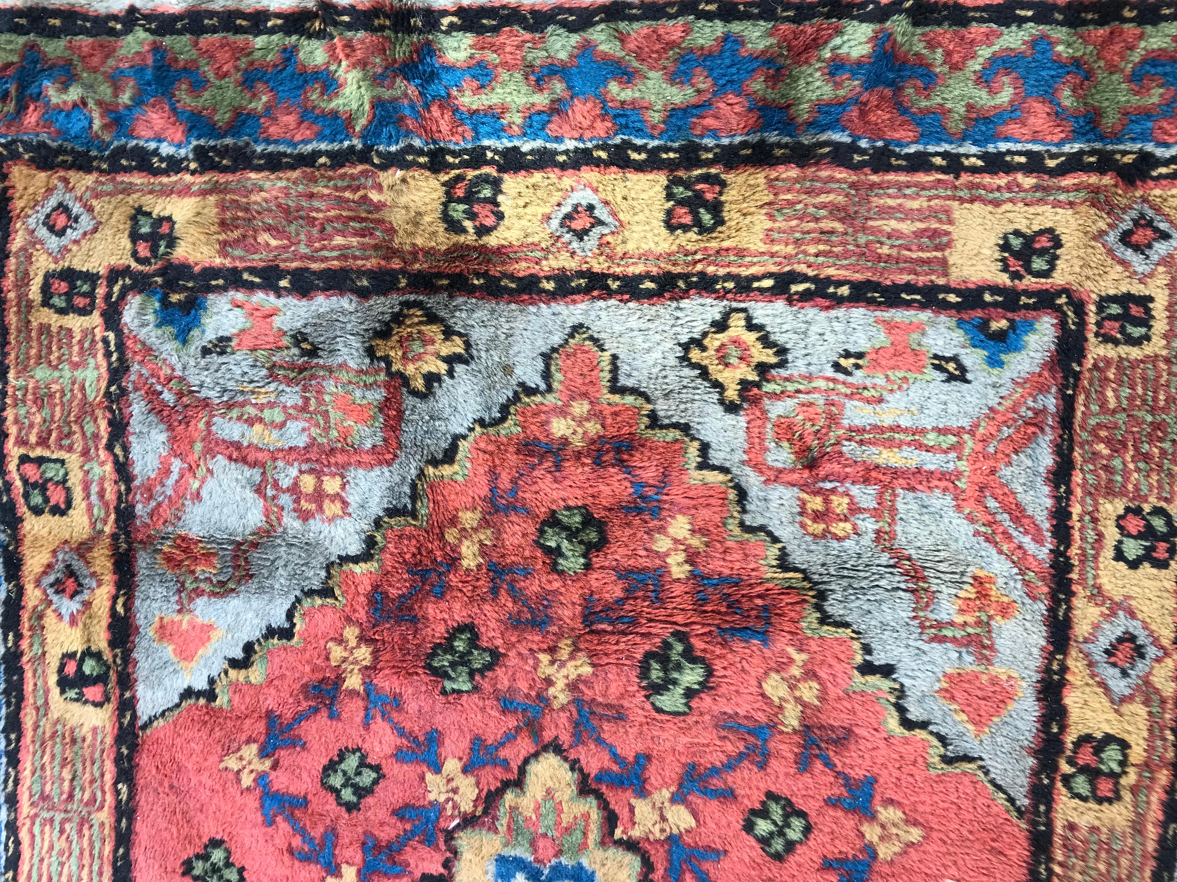 Beautiful 20th century little Sinkiang rug with a Caucasian design, nice colors, wool velvet on cotton foundation, good conditions.