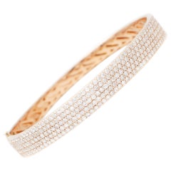 Pequeños diamantes blancos, pulsera brazalete de oro rosa de 18 quilates