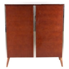Little wood and chrome wardrobe