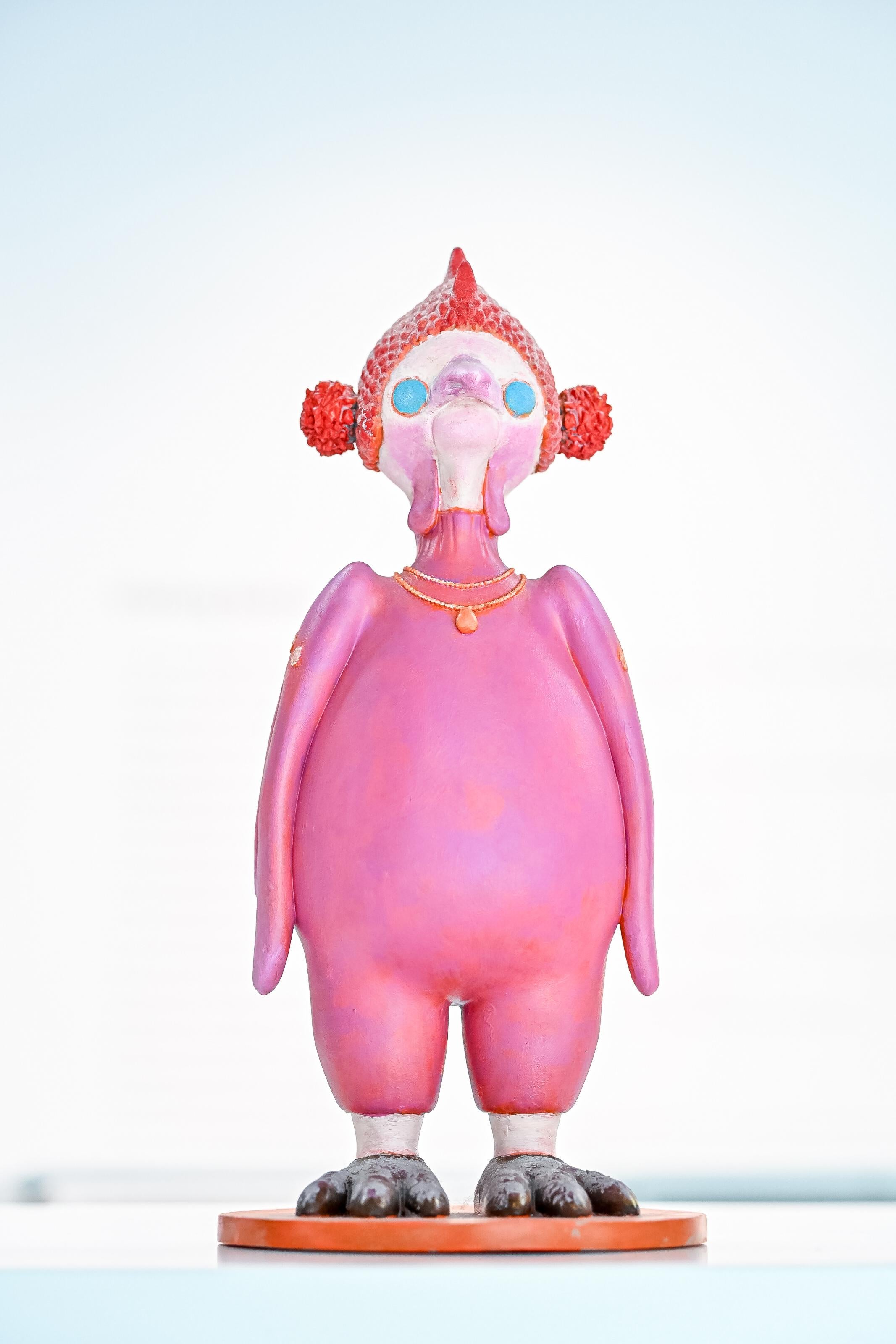 Reenforced hand colored resin,

The chicken is associated with the sound of “auspiciousness” in Chinese tradition, symbolizing light and good fortune. Within the Spirit Empire, GUGU has a humorous personality and loves to be involved in everything.