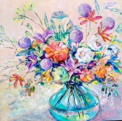 "Un bouquet festif dans un vase en verre.