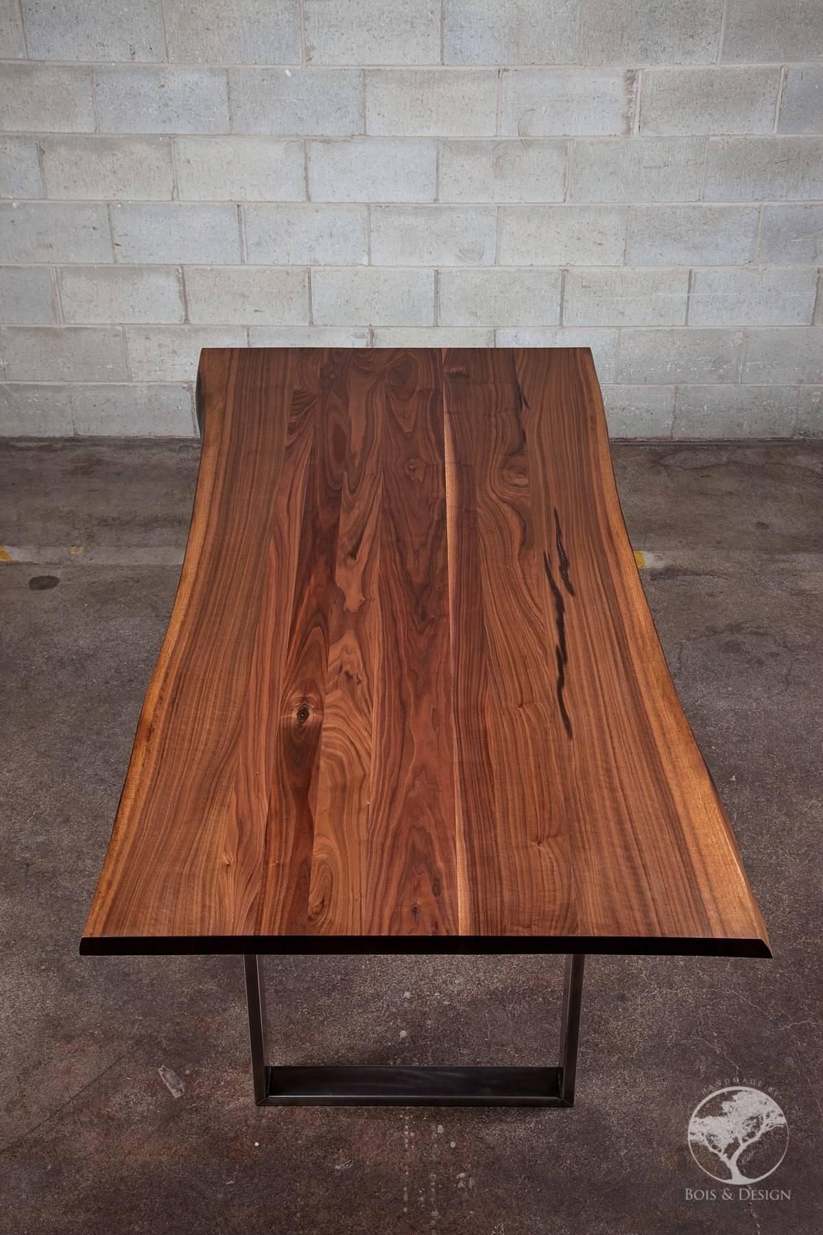 This black walnut dining table is a headturner.  It can be sitting on any style of legs. We let nature design with the curves, cracks and holes and our role is to protect the beauty by offering you one of the noblest woods in North America. The