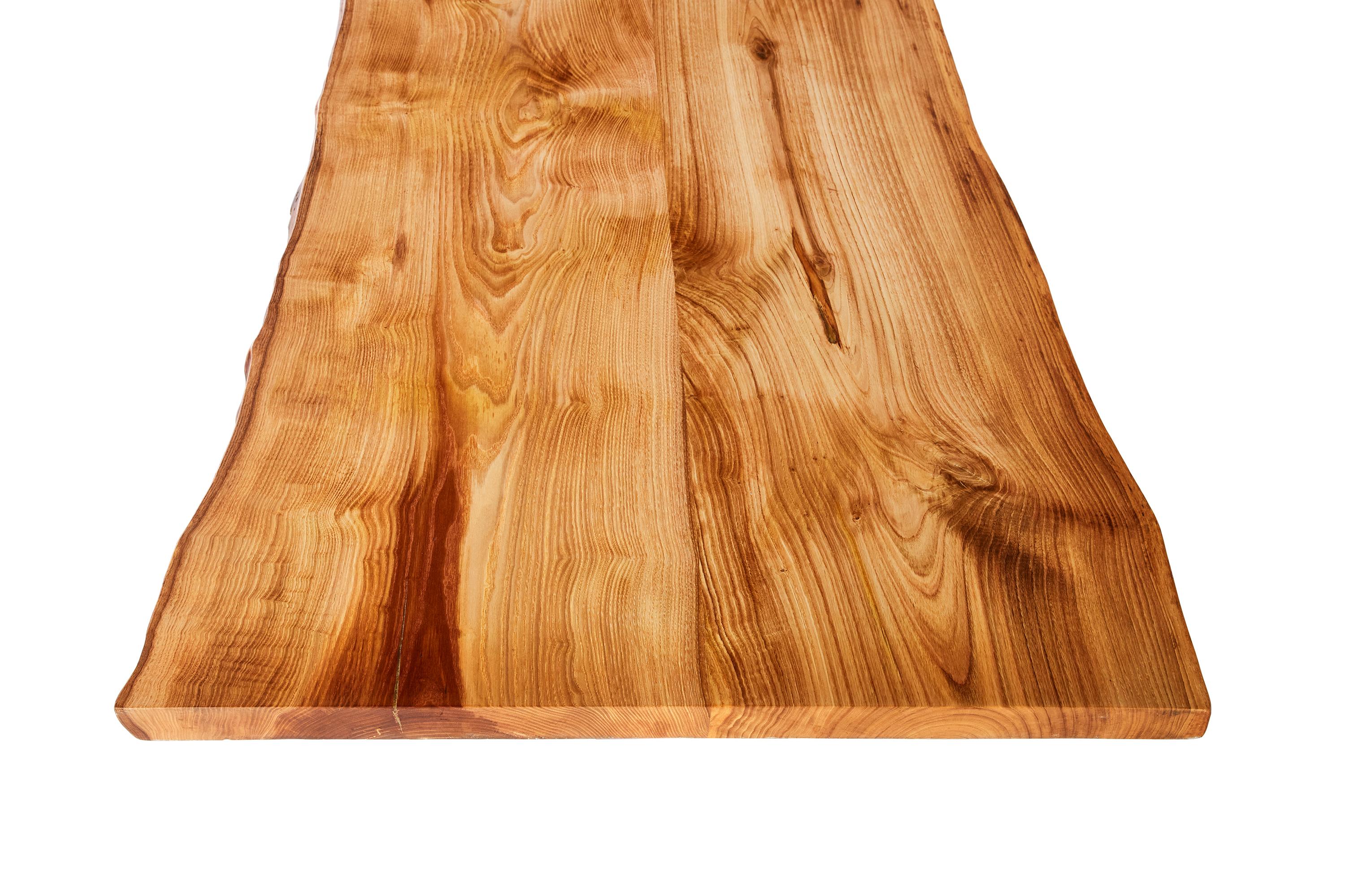 The stunning ash wood table shown here was made in Ankara, Turkey with wood gathered walnut wood from the forests of the Mediterranean. The wood is kilned and dried prior to being filled with high quality resin in areas of natural cracking. The