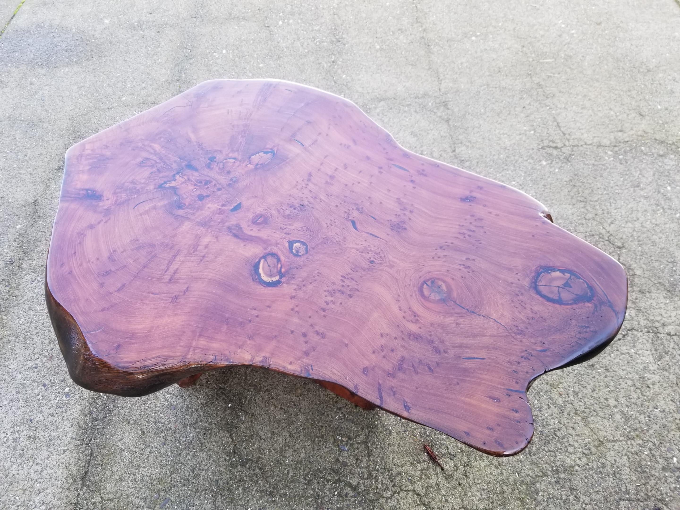 A redwood burl, live edge organic modern table. Could be enjoyed as a coffee or end table.