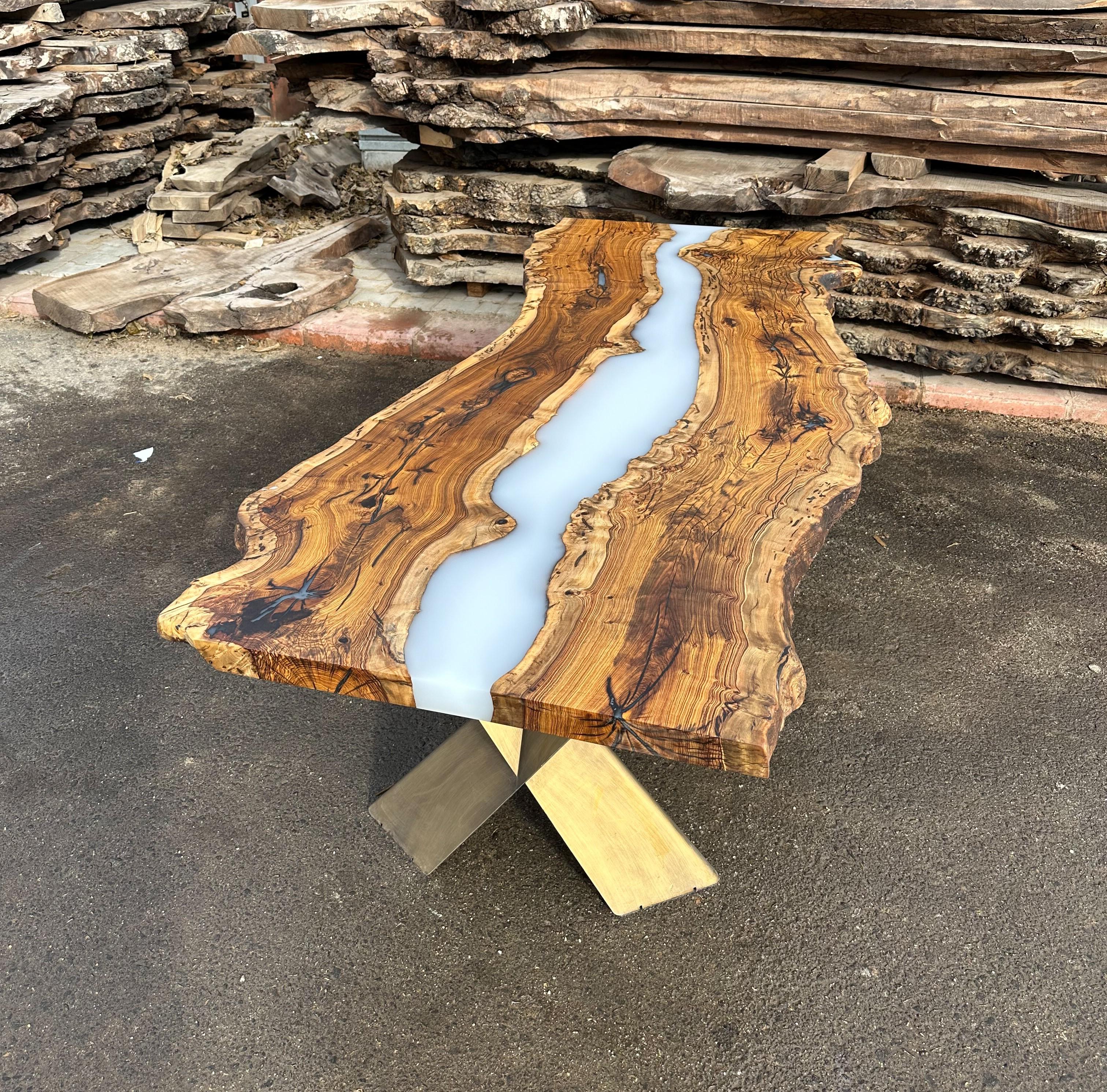 HACKBERRY CREAM RESIN DINING TABLE

This epoxy table emerges as a unique work of art, inspired by nature's beauty. 

The epoxy table stands out not only for its design but also its durability. Thanks to its epoxy coating, it is highly resistant to