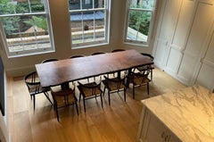 Live Edge English Oak Dining Table on Bronze Trapeze Legs by Jonathan Field.