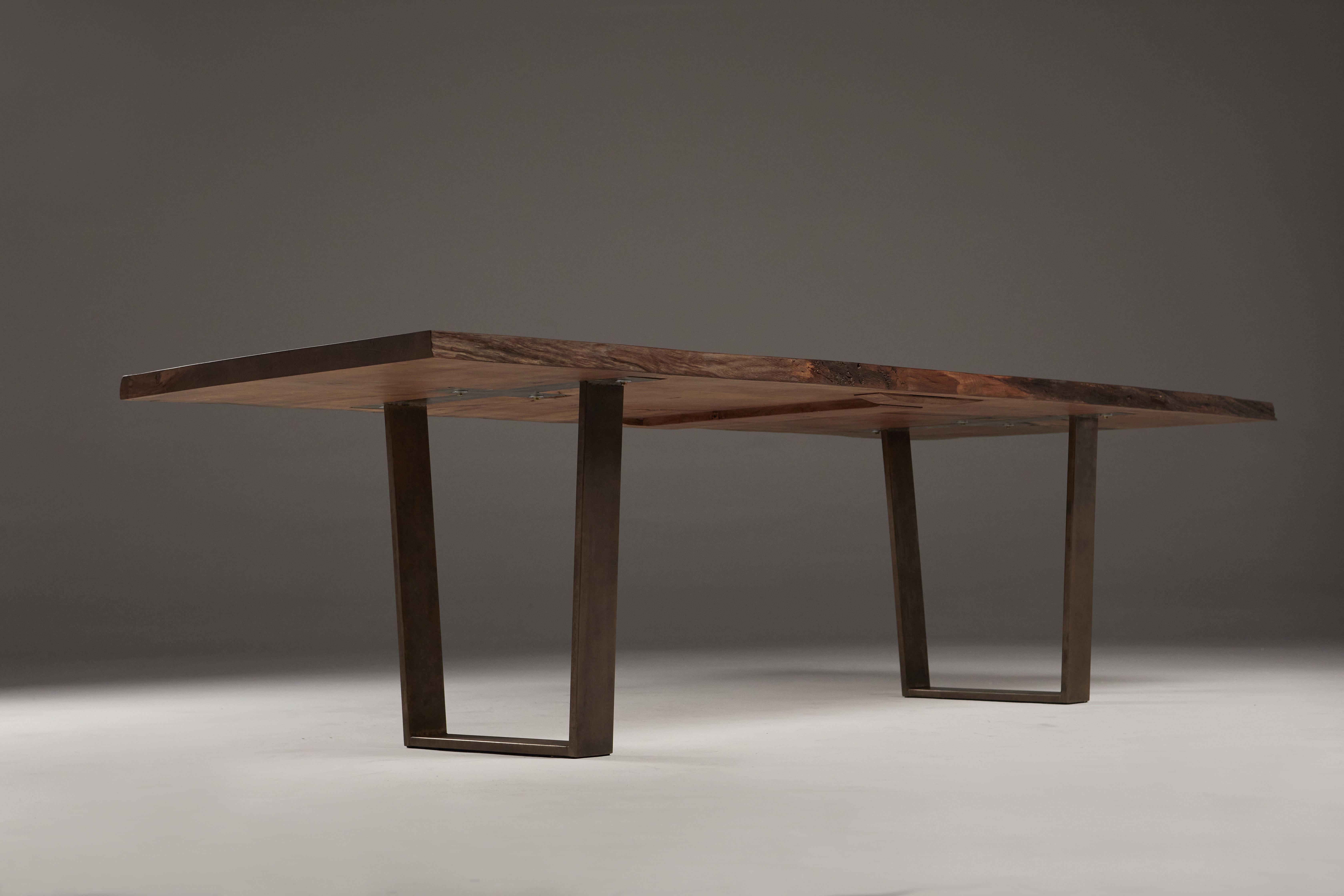 Contemporary Live Edge English Oak Dining Table on Bronze Trapeze Legs. For Sale