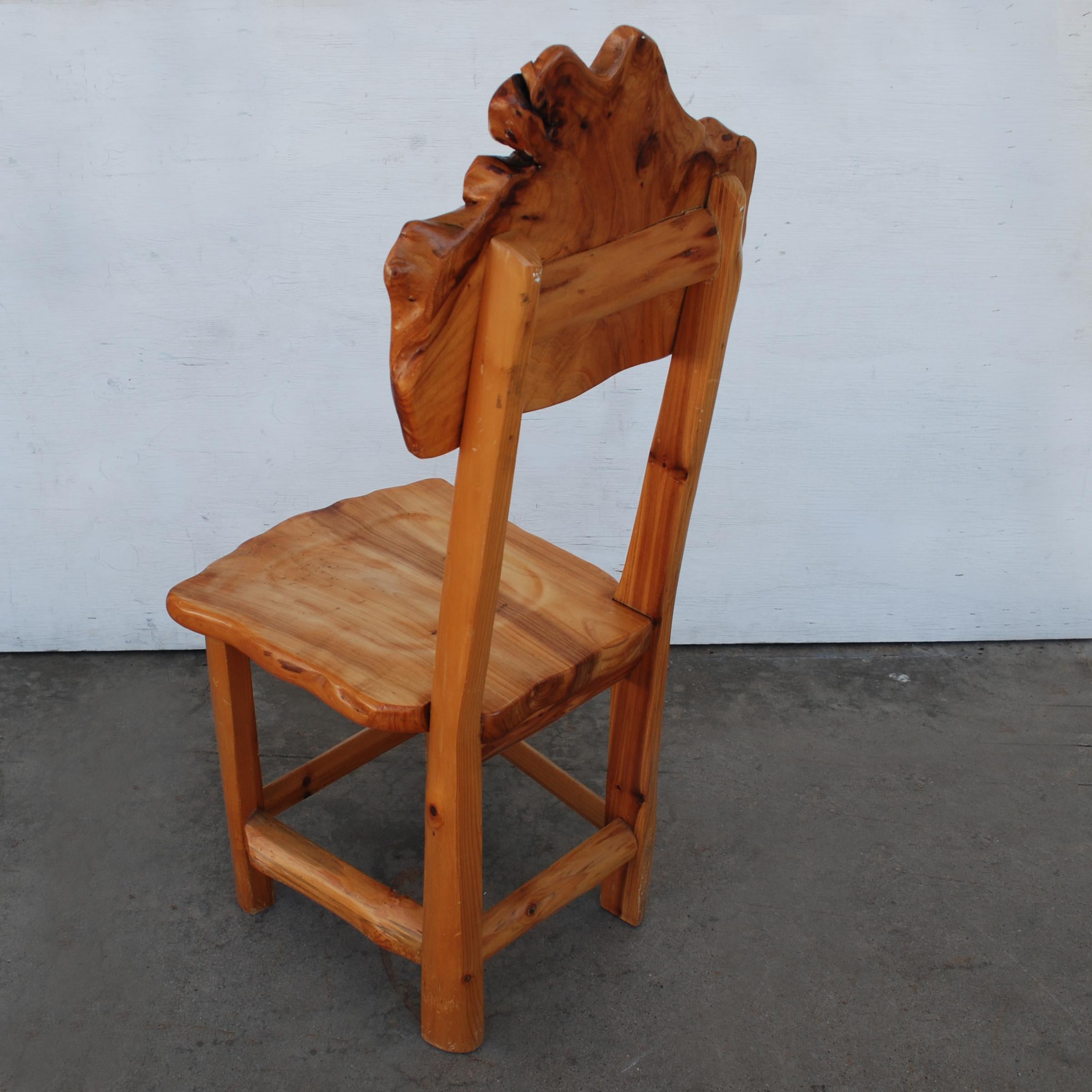 Live edge, organic freeform wood side chair

Chair is made from redwood trees, and has a very organic shape.