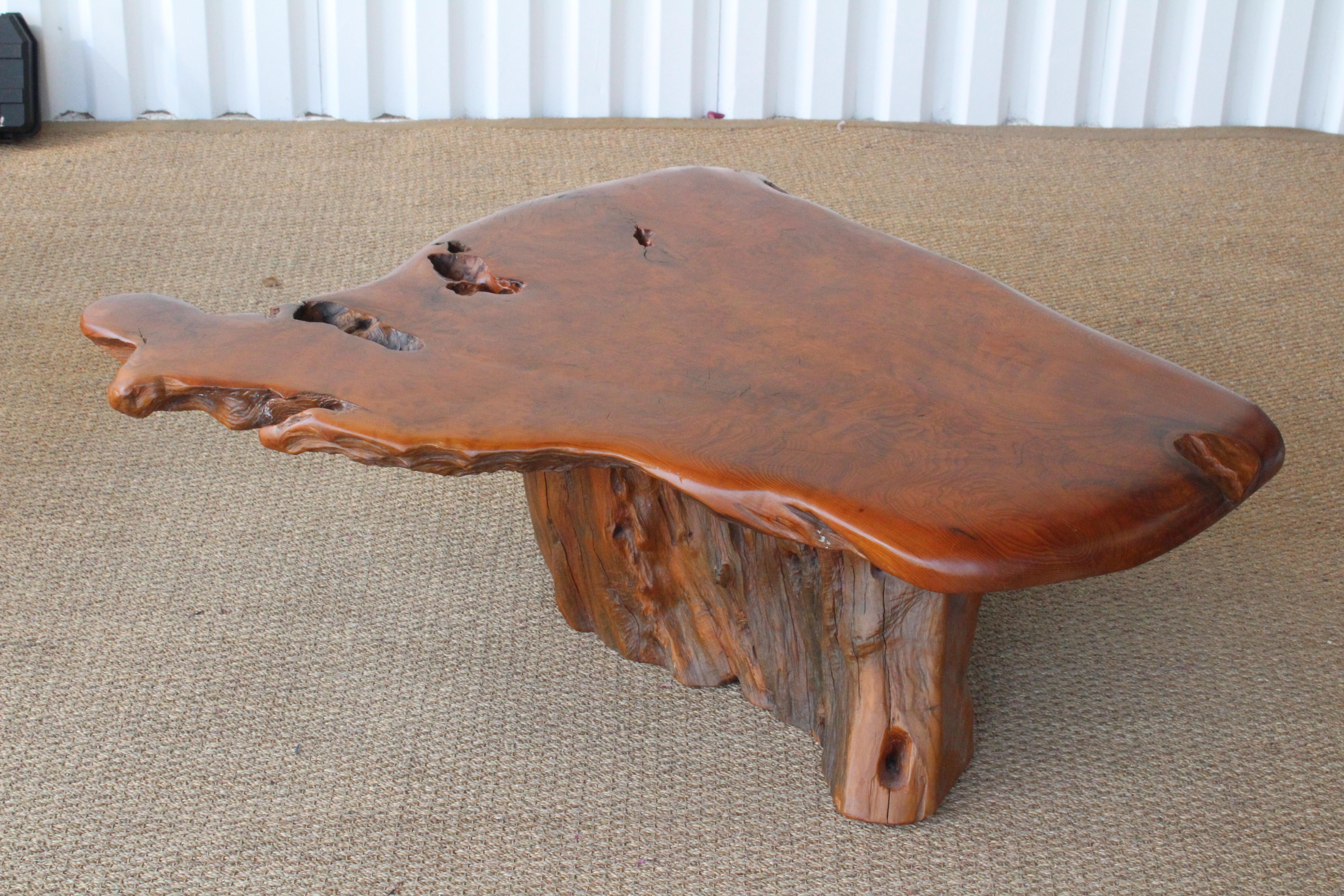 1970s live edge wood slab coffee table on rootwood base.