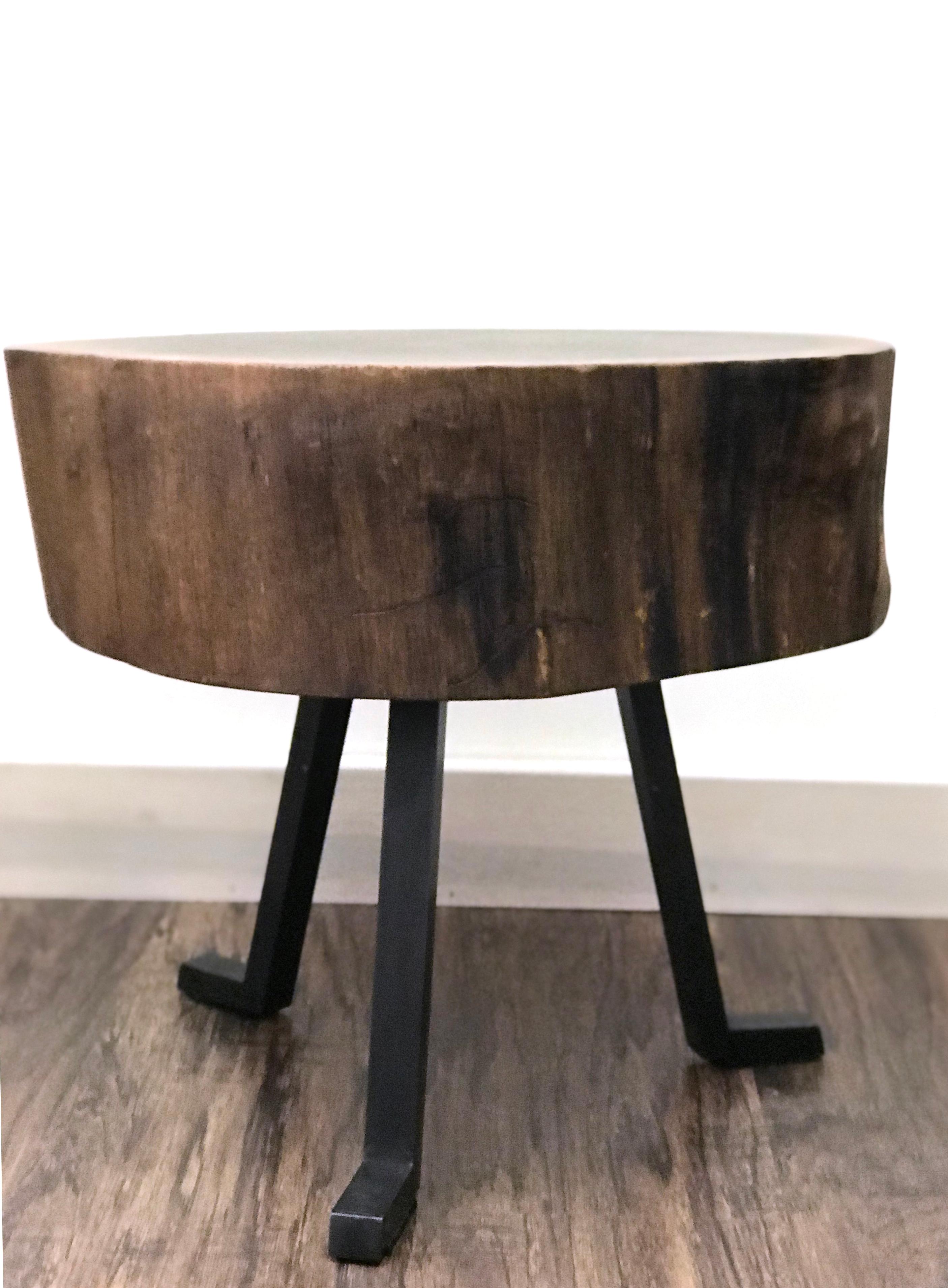 This Live Edge round side table in walnut is an occasional table, a coffee table, or a side table. We call it the Sputnik table. It is certainly irregular and that’s why you’ll love it. The three metal legs attached to live edge piece timber evoke