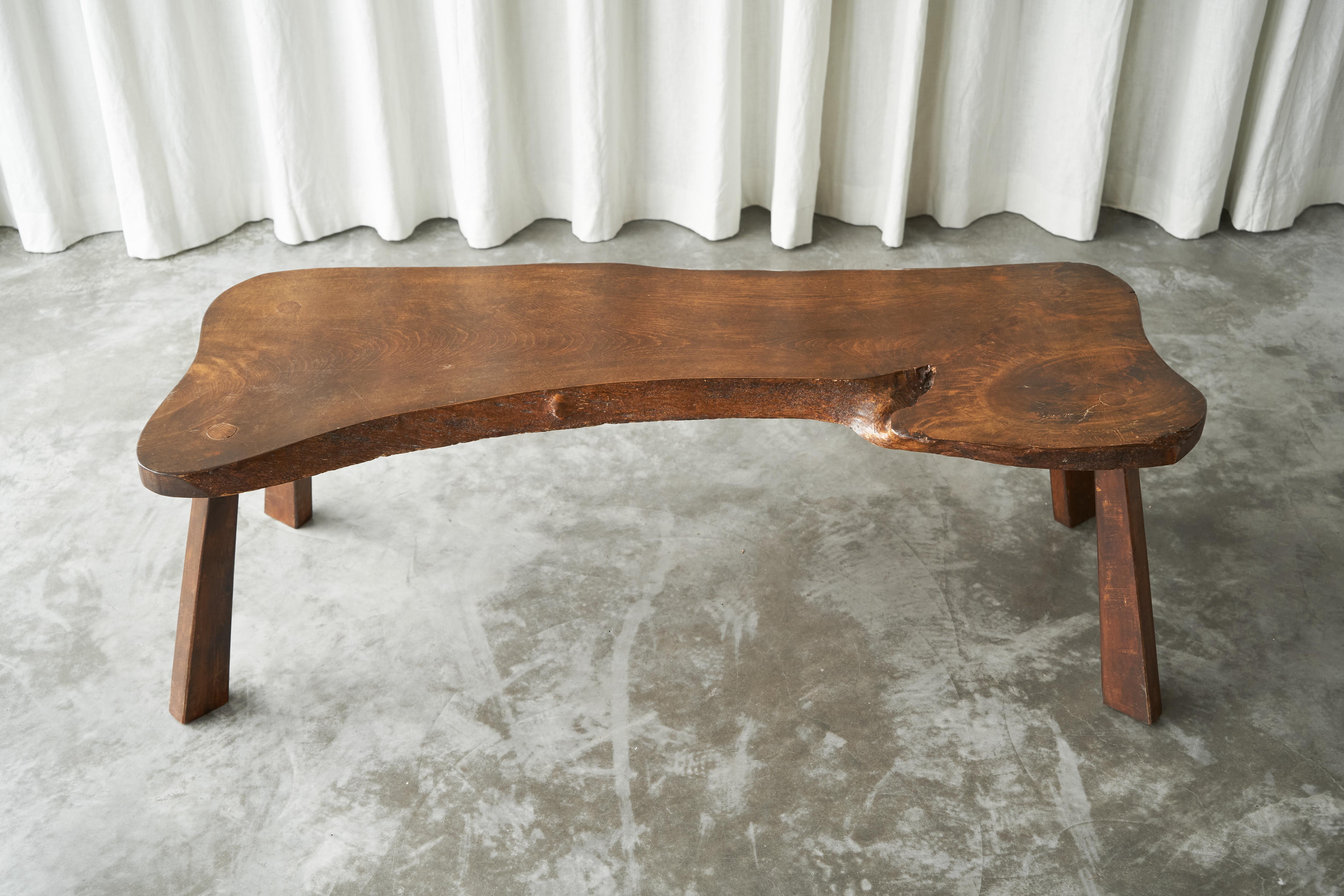 Live Edge Solid Elm Wood Coffee Table 1950s

A true gem this is, this live edge coffee table. Made by an unknown woodworker in the 1950s, in beautiful solid Elm wood. Its appearance shows similarity to the work of George Nakashima, one of the
