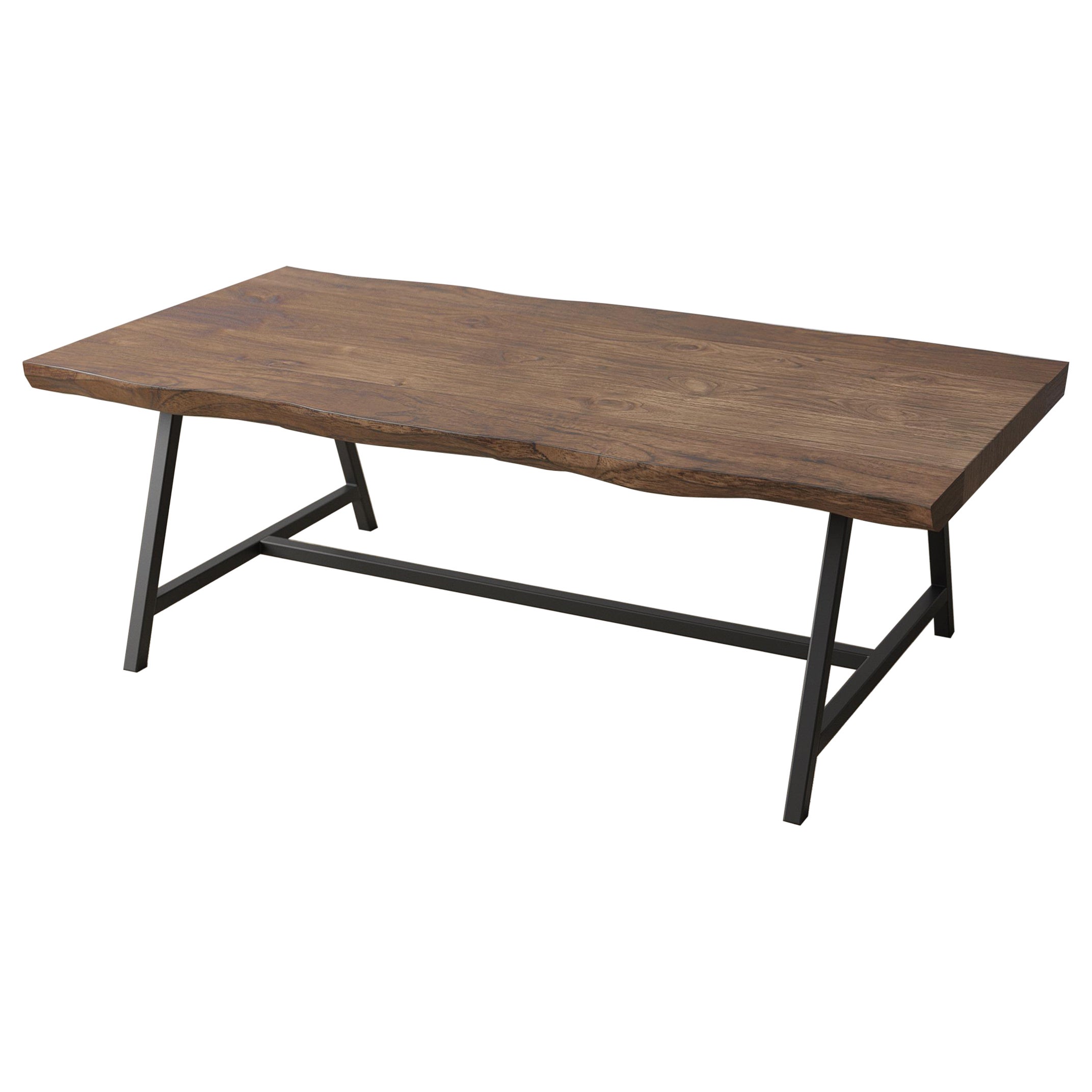 La preciosa mesa de centro de borde vivo está hecha a mano con teca maciza 100%. Aquí en tamaño 48x30, cada mesa se construye por encargo y puede hacerse según las especificaciones de tamaño y en cualquiera de nuestros seis acabados. Esta pieza está