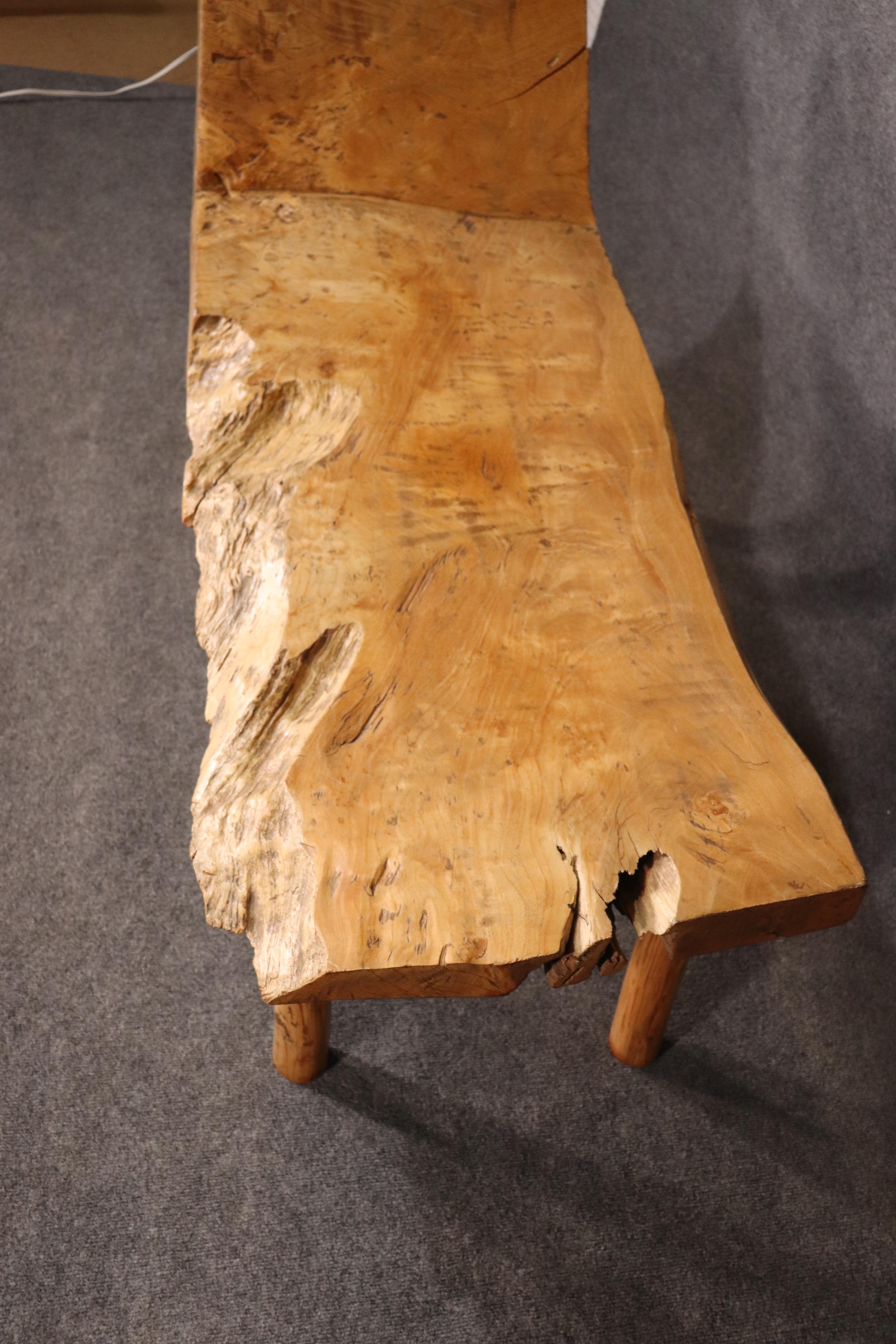 This is a beautiful vintage studio-made live edge chaise. This is not a new item made because of the current fascination with this style. This is an older piece dating to circa 1970 or so.
Measures: 22 wide x 63.5 long x 32 tall seat height is 18.5.