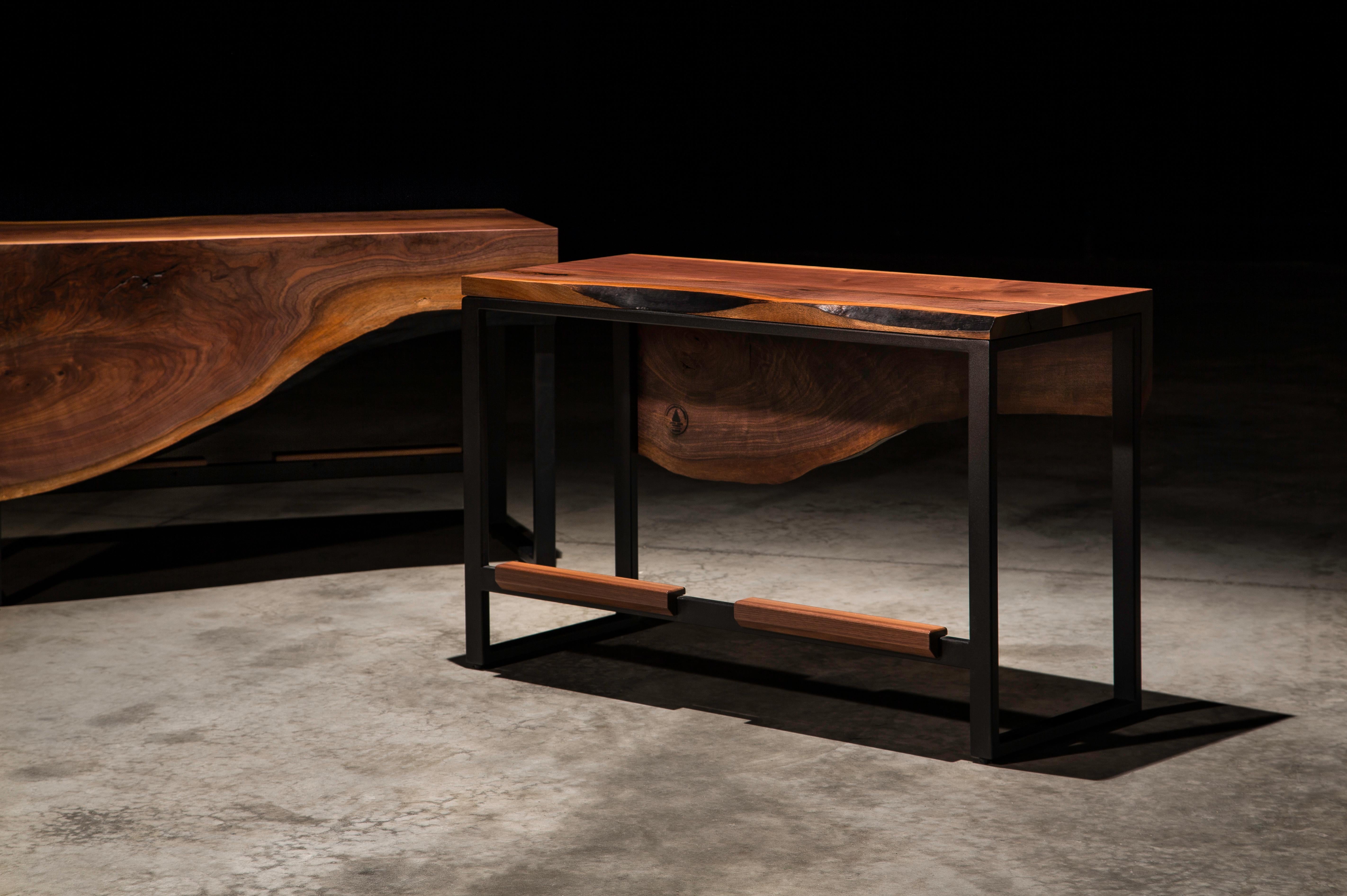 Using live edge walnut slabs and blackened steel bases, the Wabash benches have a modern style while emphasizing the natural beauty of the walnut. Using a mitered edge, the Wabash benches also have a waterfall effect. Pricing is per each