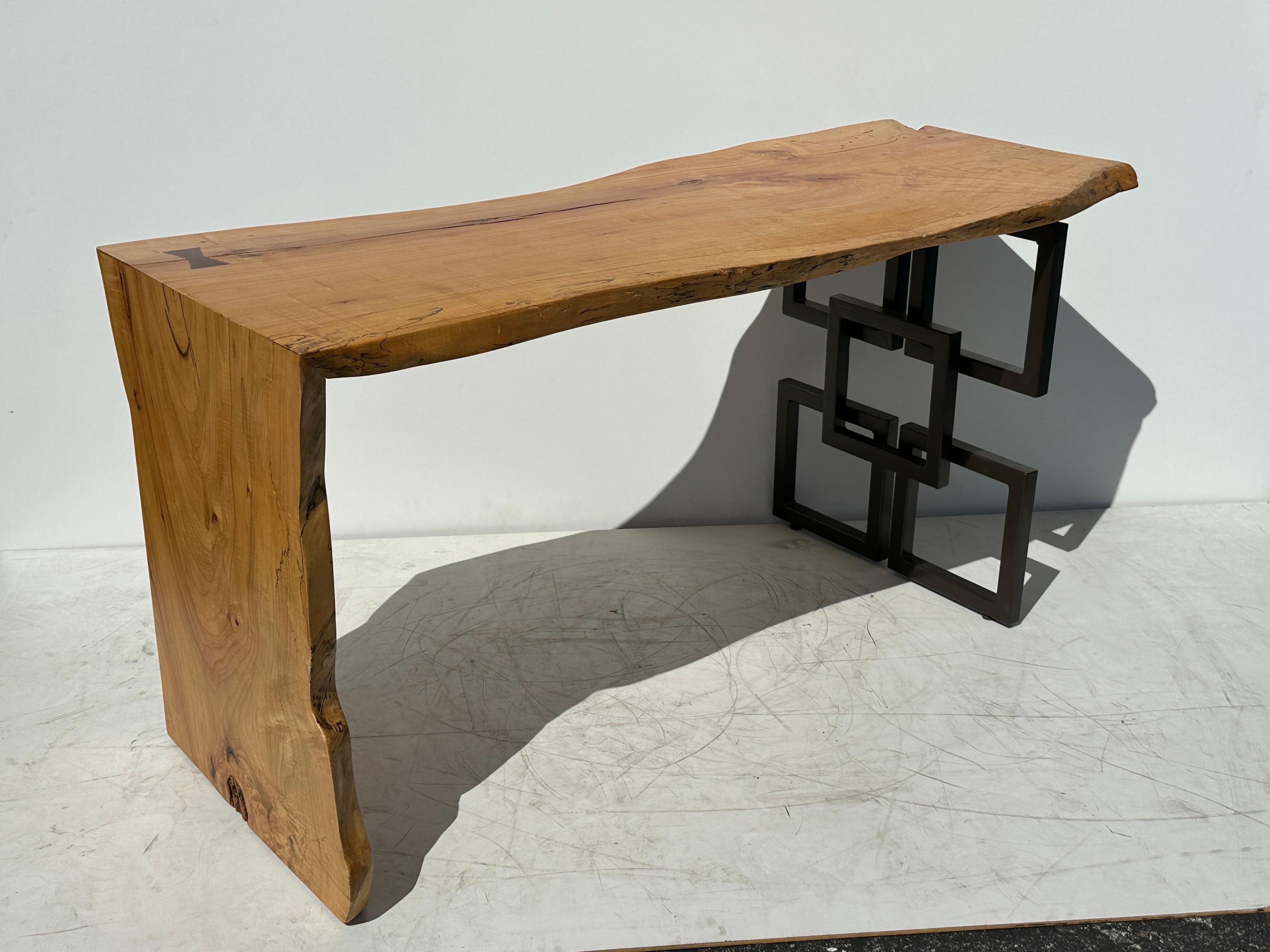 Beautiful natural live edge waterfall desk or console table with walnut butterfly detail.