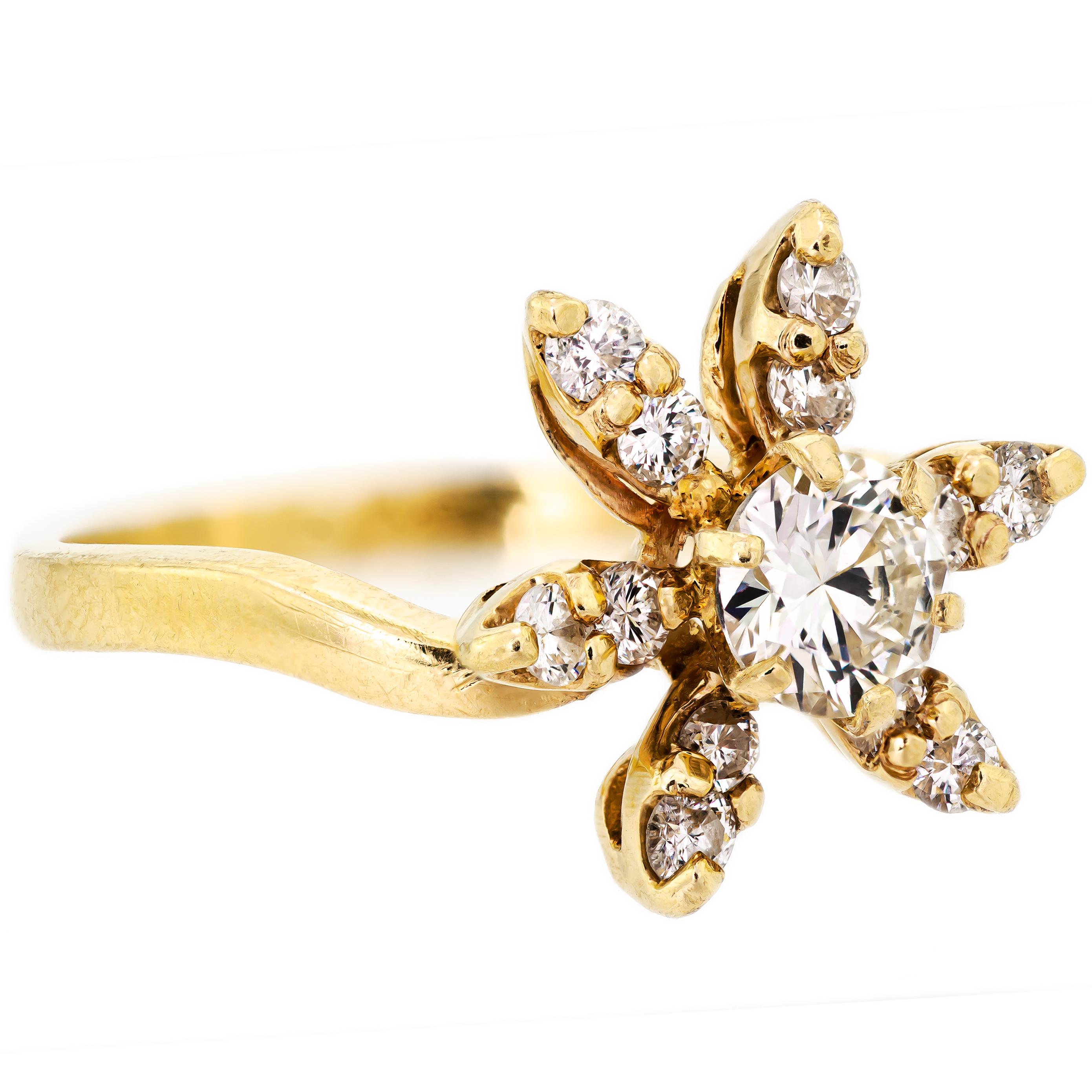 This lively dainty flower design diamond ring is showcasing thirteen (13) dazzling round Brilliant-Cut diamonds totaling 1.05ct. The center of the flower design is set with one (1) round 0.55ct brilliant cut diamond. Six (6) petals surround the