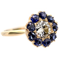Lively Old European Cut Diamond and Sapphire Halo Ring