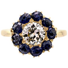 Antique Lively Old European Cut Diamond and Sapphire Halo Ring