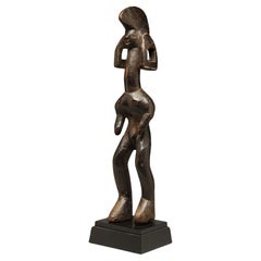 Lively Standing Mumuye Figure with Expressive Face, Open Hair, Crest, Nigeria