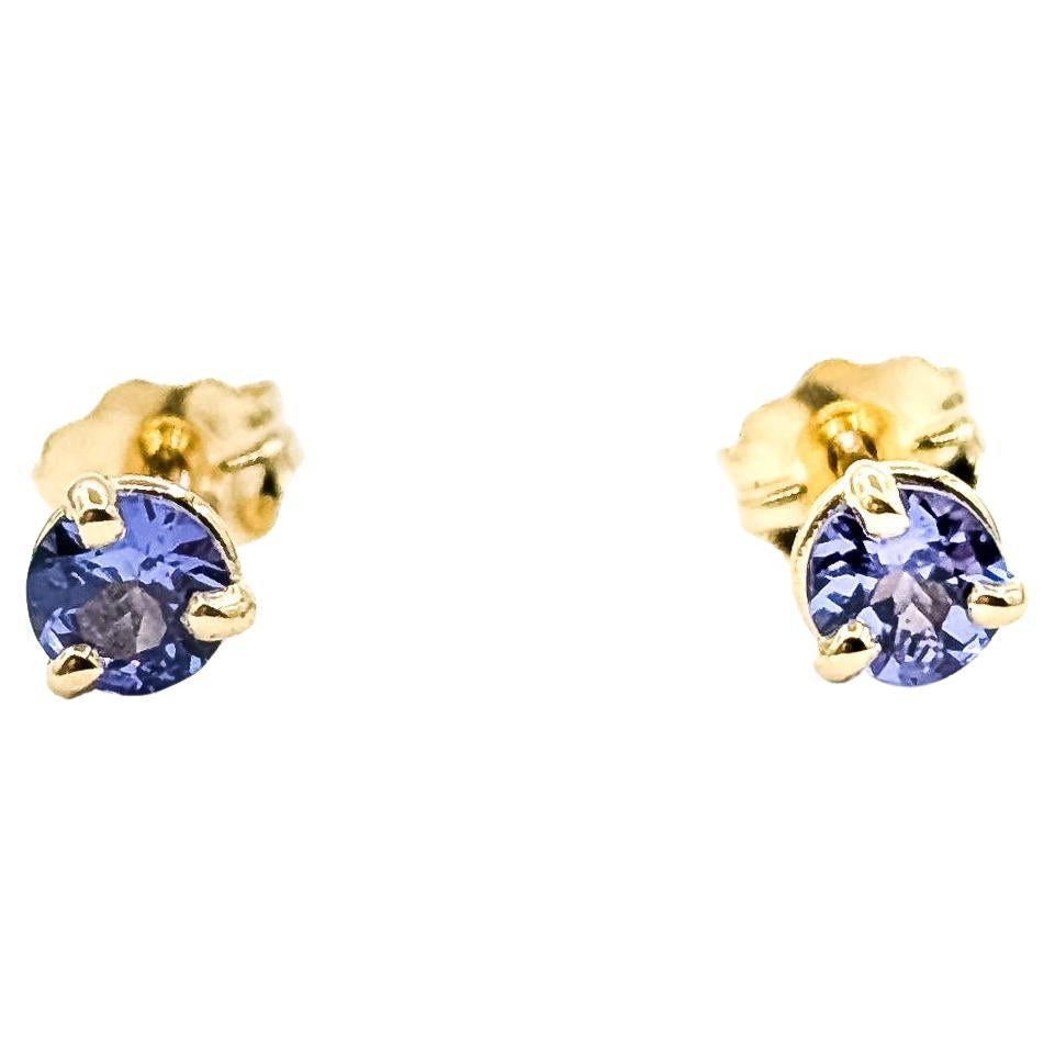 Orecchini con tanzanite vivace in oro giallo 14k