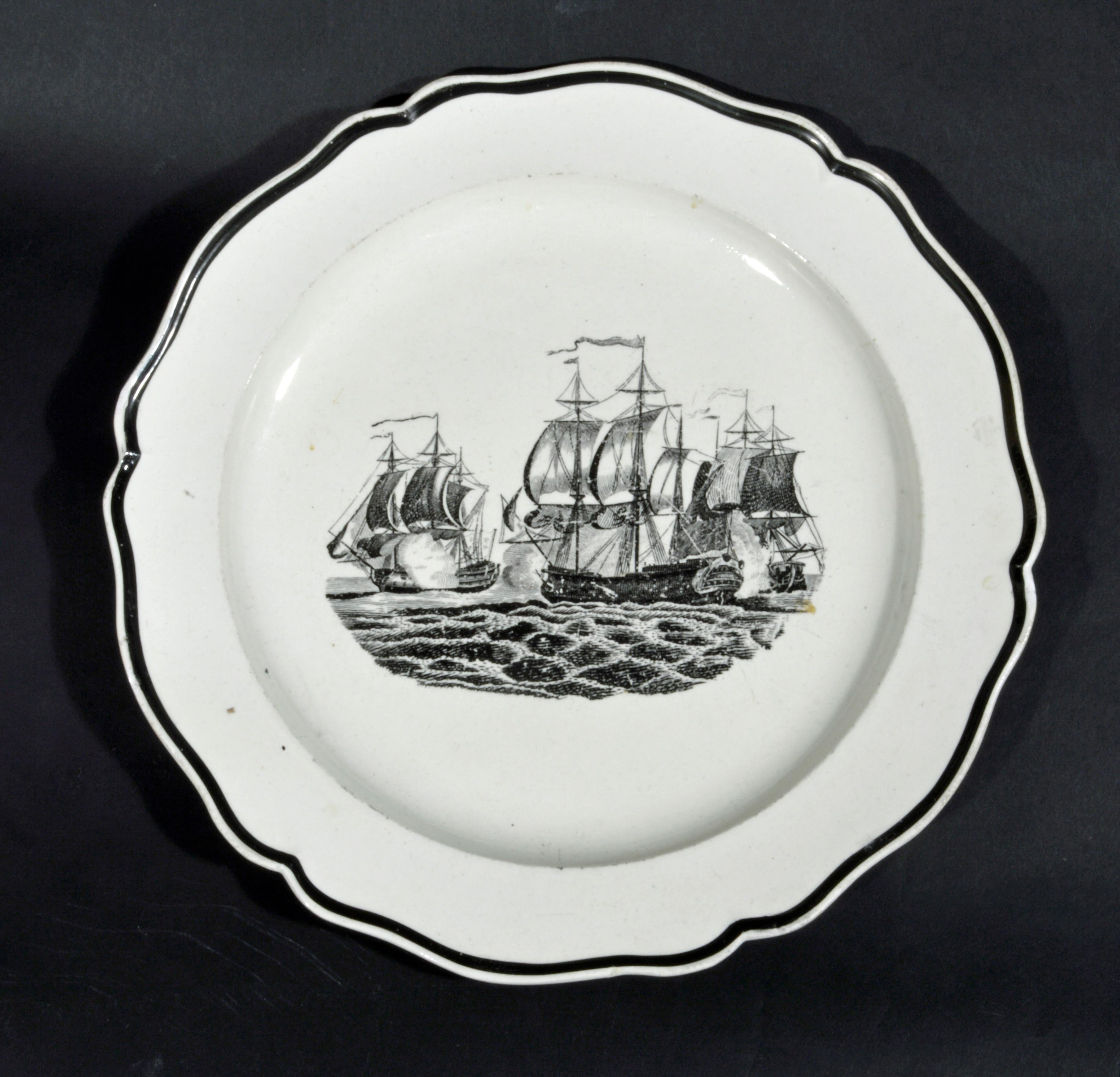 Liverpool Pearlware Plates decorated with Ships,
Pair,
Circa 1800.

The Liverpool pottery pearlware plates with black rim are each printed with the image of a naval engagement.

Diameter: 9 3/4 inches

The Liverpool pottery pearlware plates with