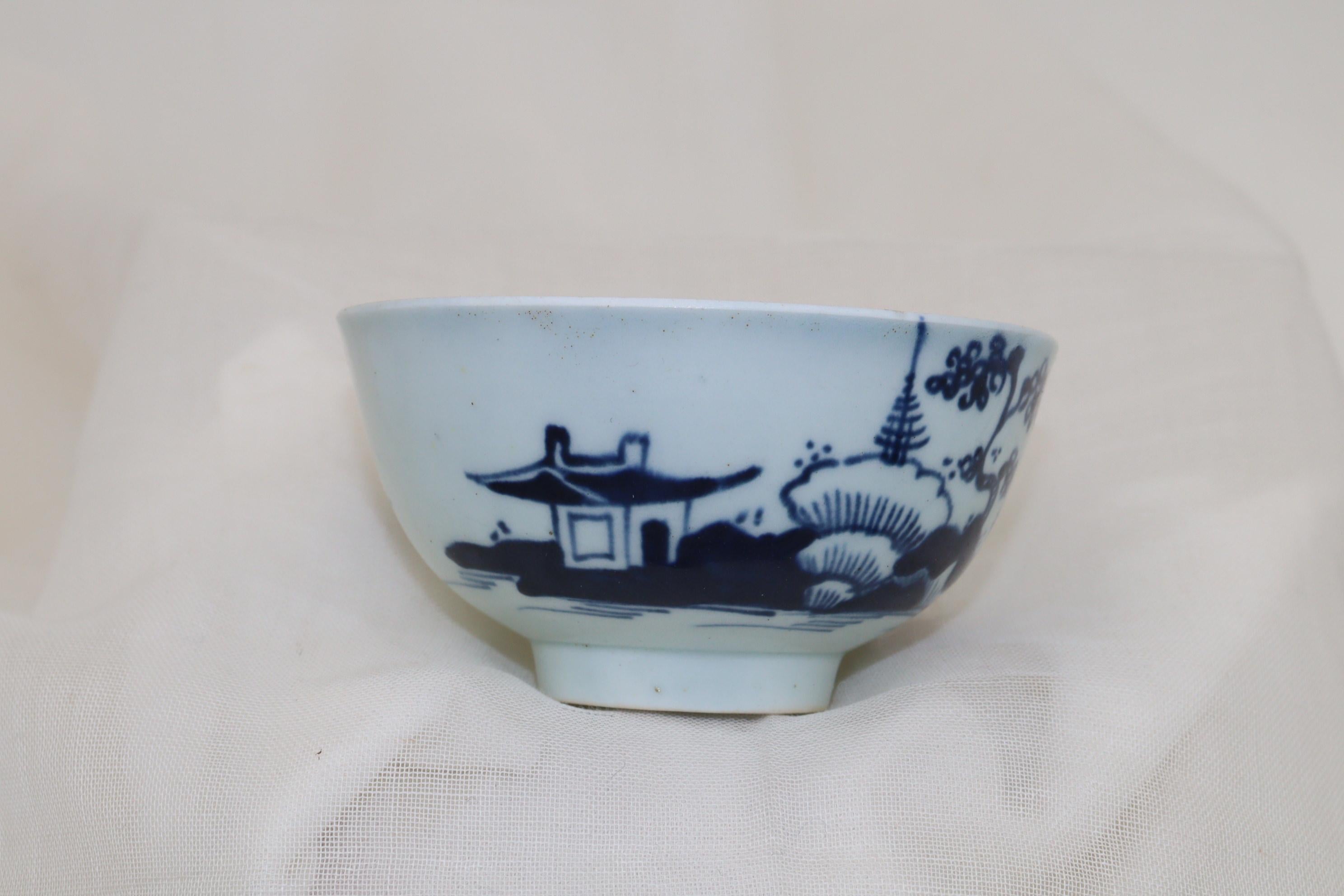 English Liverpool porcelain hand painted tea bowl and saucer For Sale