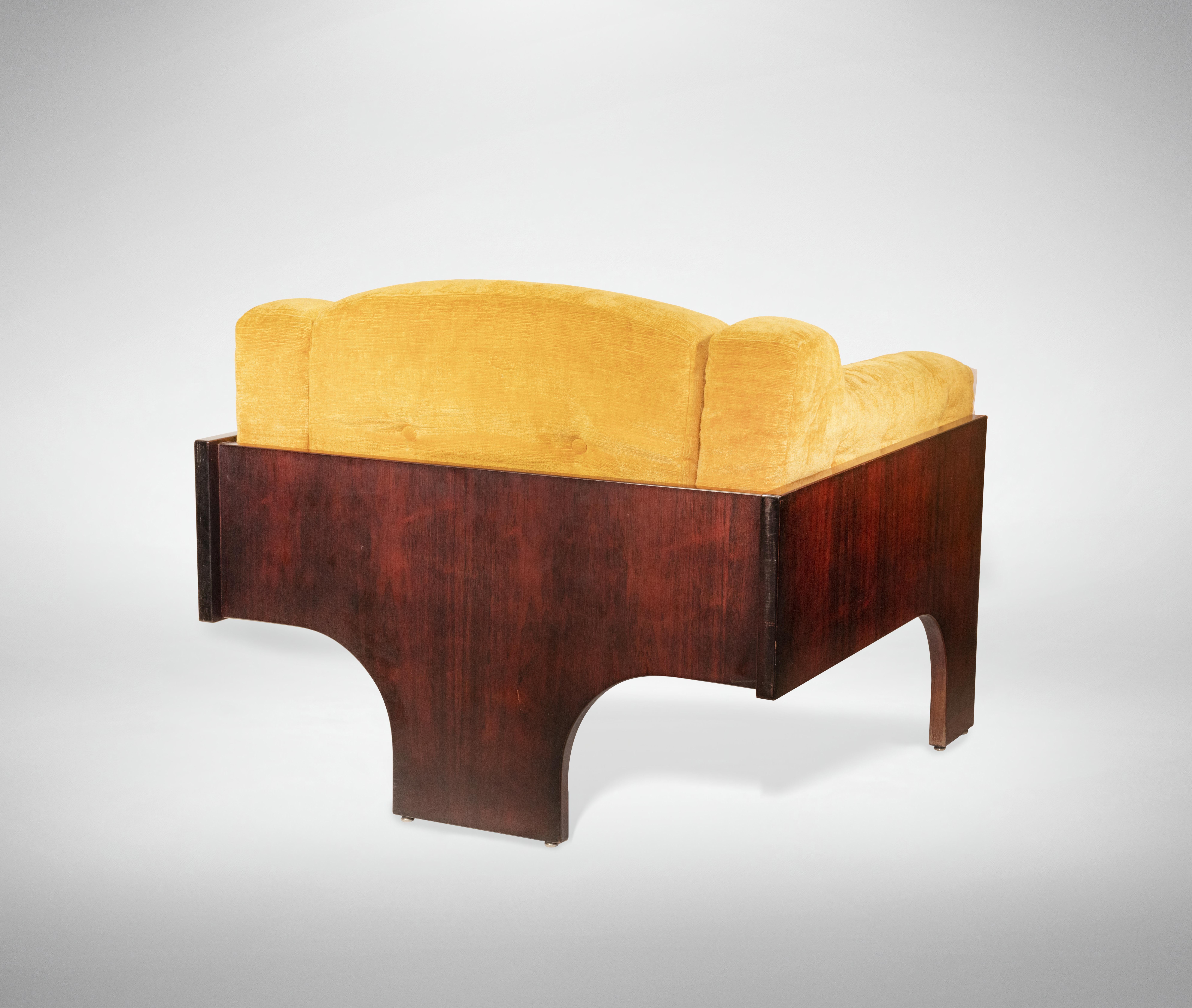 Living room set is an original design item realized in the 1970s by Claudio Salocchi  (Milan, 1934–2012) for Sormani

Created in Italy in the second half of 20th century.

Rosewood), Yellow Velvet.

- Dimensions

Armchairs: h. 68 x l.85 x d. 85 cm -
