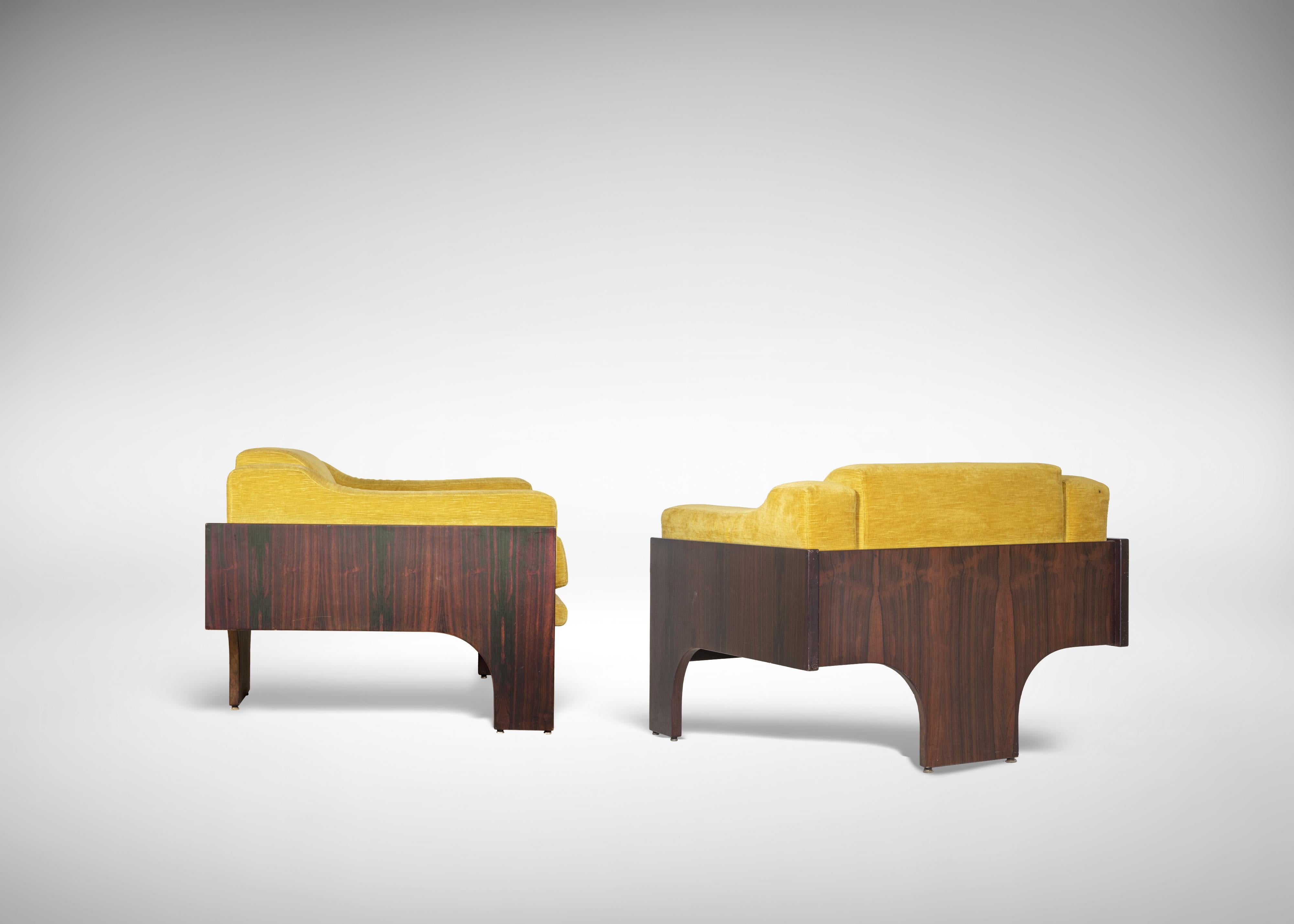 Living room set is an original design item realized in the 1970s by Claudio Salocchi  (Milan, 1934–2012) for Sormani

Created in Italy in the second half of 20th century.

Rosewood, Light Yellow Velvet.

- Dimensions

Armchairs: h. 68 x l.85 x d. 85
