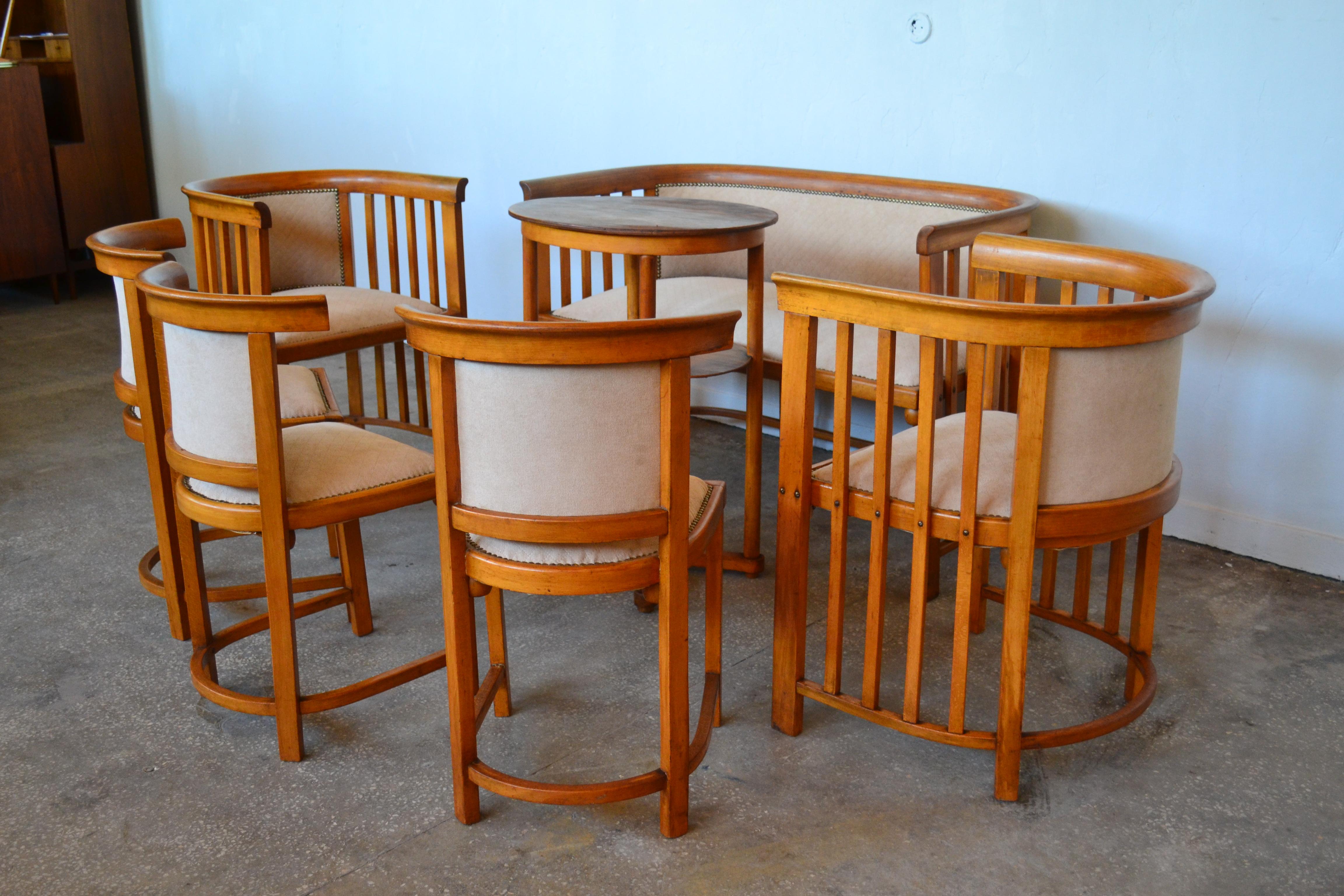 Vintage design,

This large dining set was designed by Josef Hoffmann for Jacob & Josef Kohn and is from 1905. It consists of a sofa, two armchairs, three chairs, and a coffee table. It has been reupholstered and the original springs were tied.