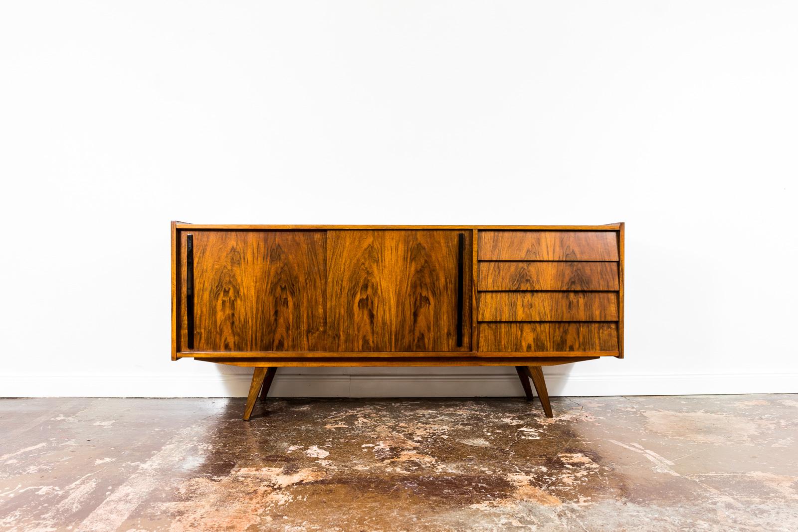 Living room set from Slupskie Furniture Factory, 1960's, Set of 3.

This unique living room set has been manufactured in on of the best furniture factory in Poland of that period. Outstanding walnut veneer, great shape and professional renovation