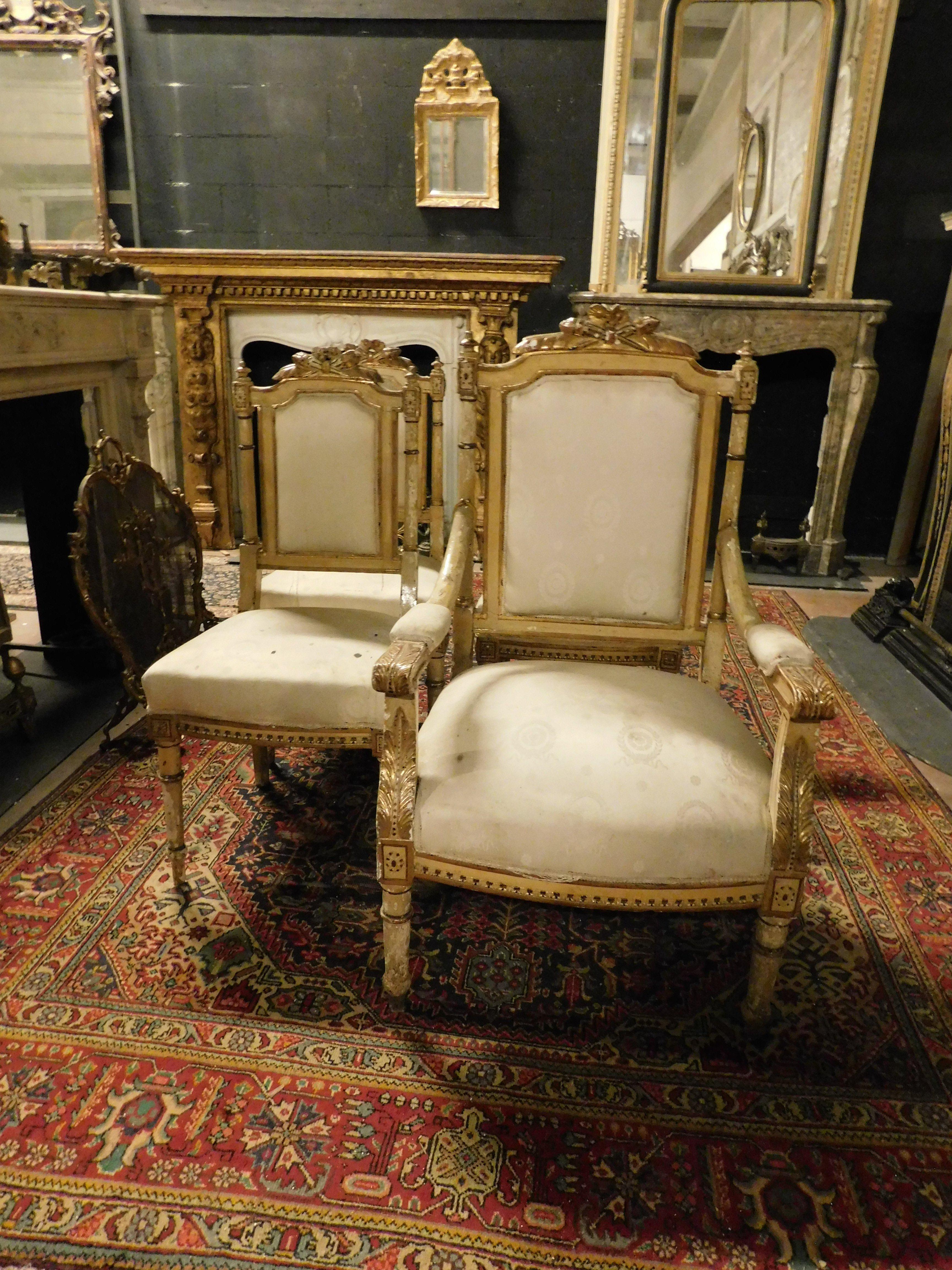Italian living room set with 1 armchair and 3 carved and gilded chairs, Italy For Sale