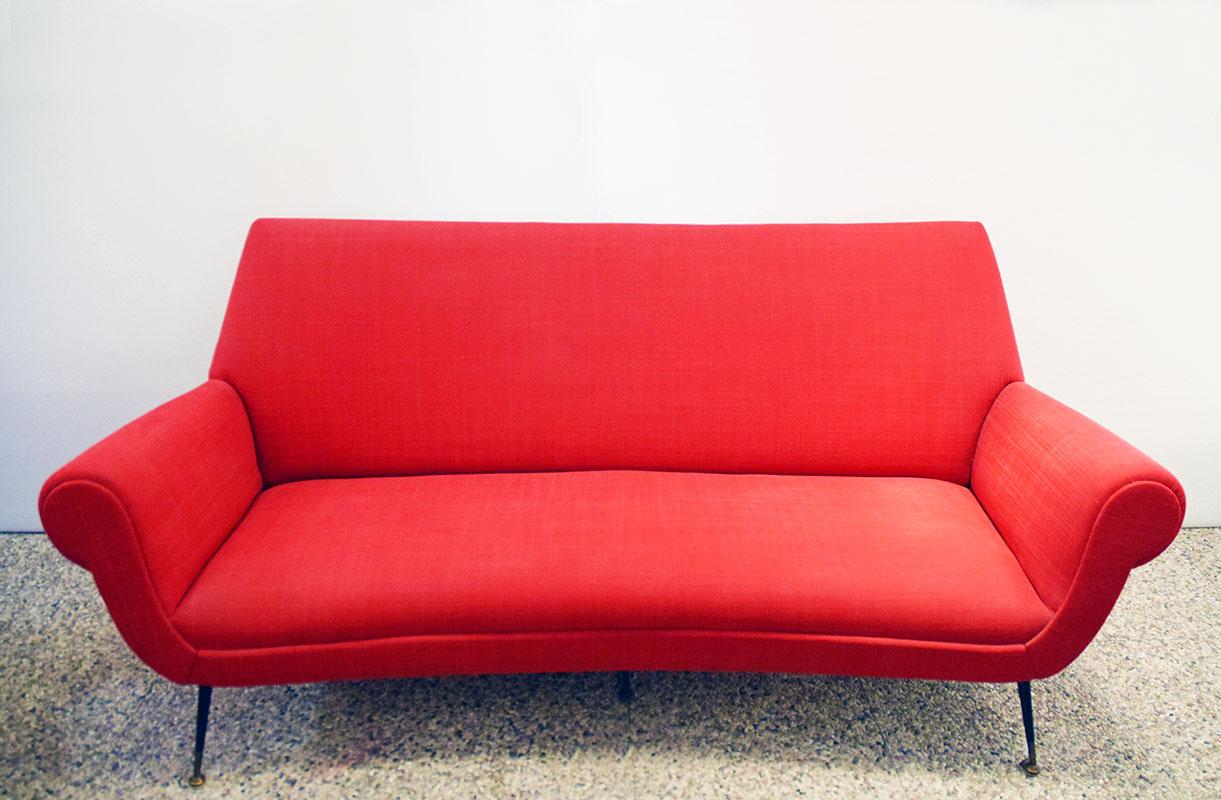 Living room set with a three-seater sofa and two armchairs in fabric, Italian production from the 1960s.
Wooden frame, padded and covered in fabric, metal legs with brass ends.
Sofa with curved anatomical backrest.
In excellent condition, perfect