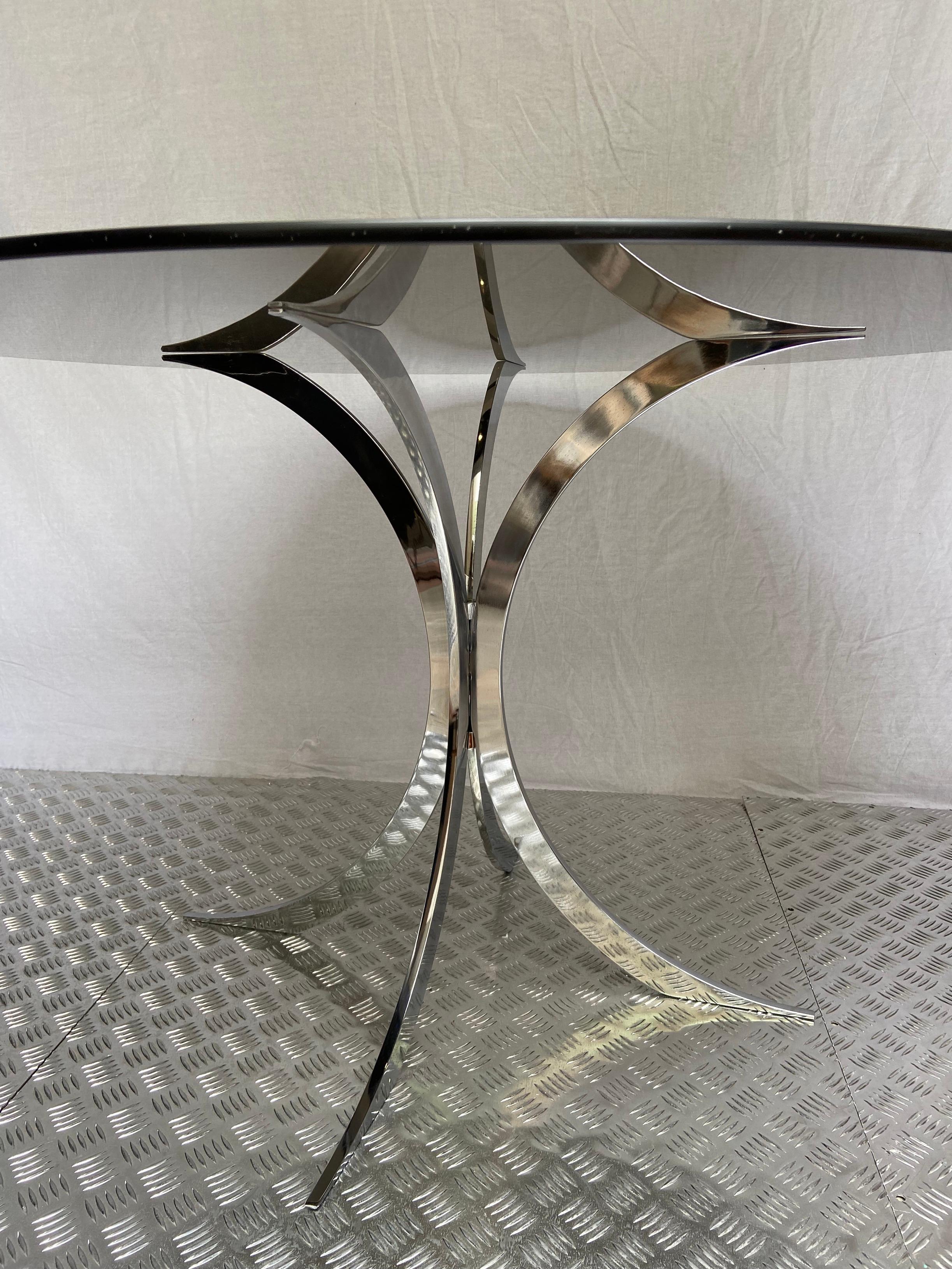 Living room table - Boris Tabacoff
Edited by Christofle
Circa 1970
Chromed metal base and smoked glass top
H73xD120.
