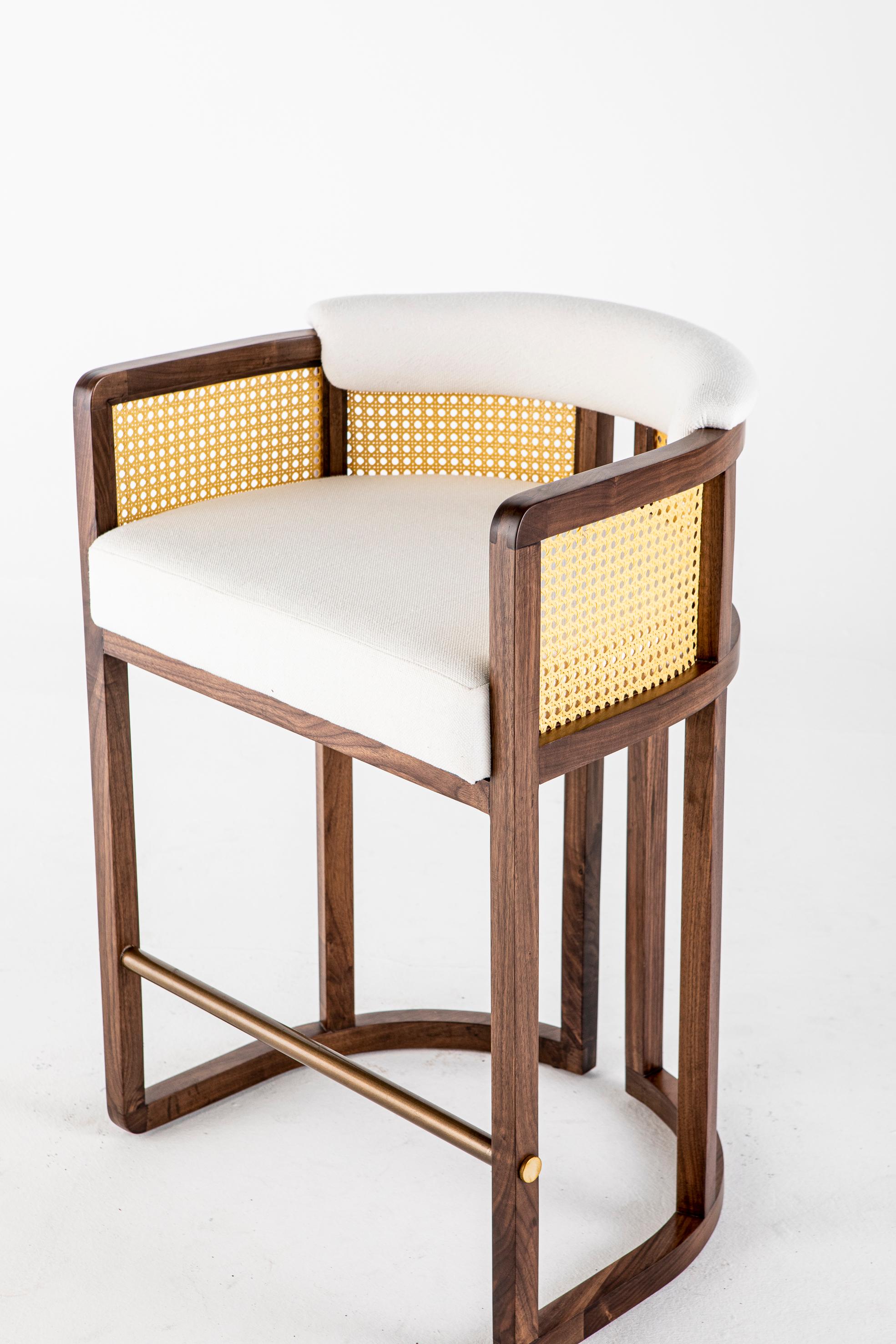 Livingston bar stool by Egg Designs.
Dimensions: 62 L X 49 D X 90 H cm
Materials: walnut timber, synthetic rattan, linen upholstery.

Founded by South Africans and life partners, Greg and Roche Dry - Egg is a unique perspective in contemporary