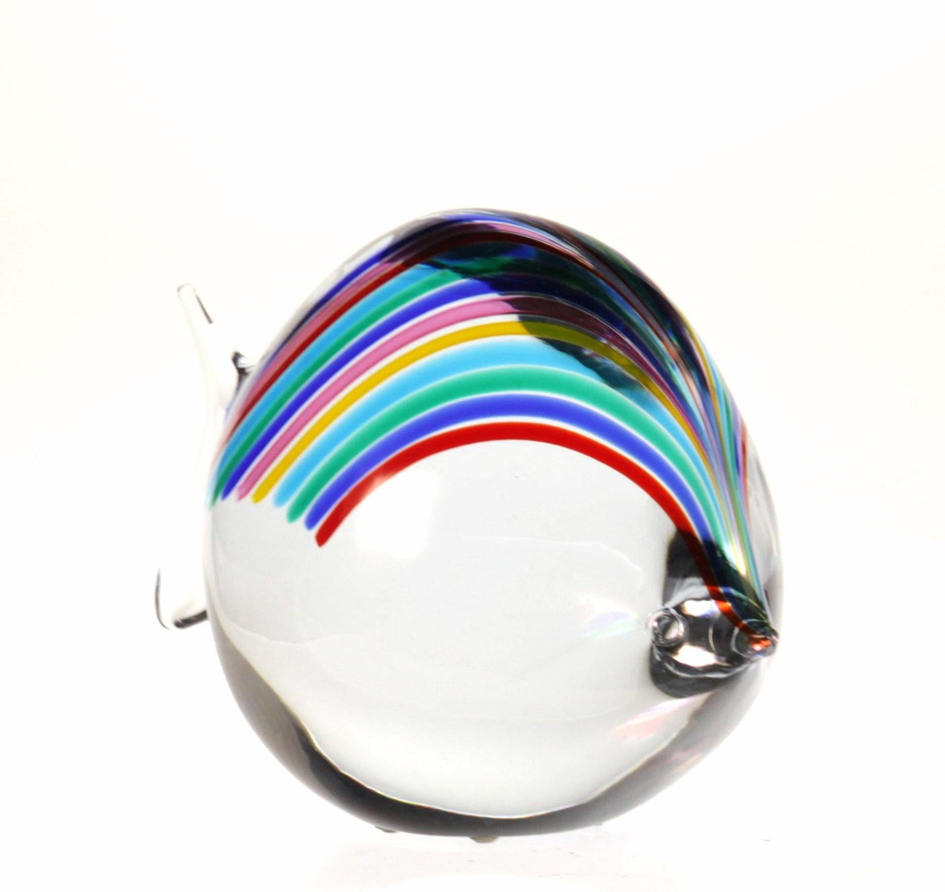 Massiccio fish with the rainbow cane sequence of Livio Seguso. This sequence was used in several pieces, bowls to be highlighted with lens effect of the piece.

The fish body acts like a magnifying lens and the colors are moving when looking at