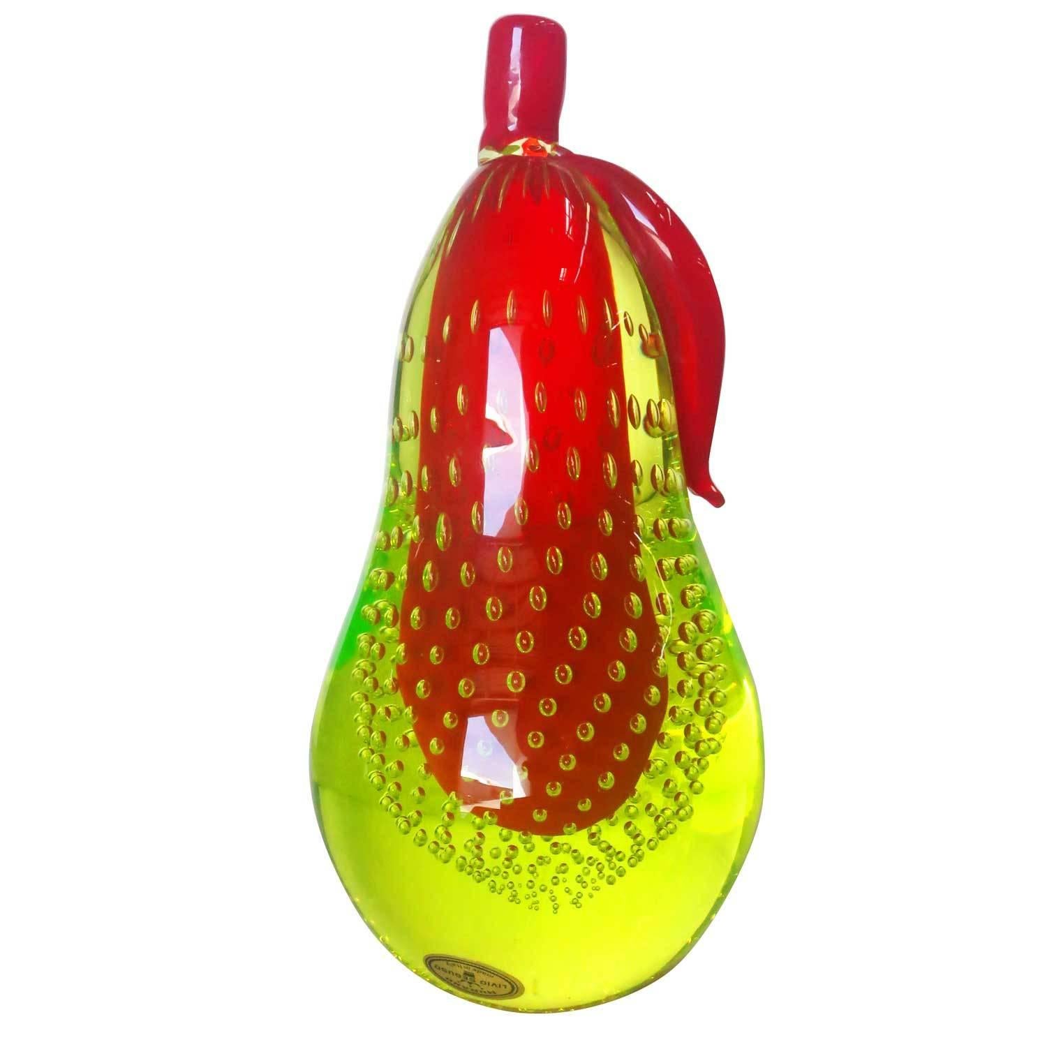 Beautiful Murano handblown art glass with red over green and controlled bubbles. The set features a pear with an apple, each with a polished side and bottom. They make great BookEnds

Signed Livio Seguso, circa 1960.

Italy, circa 1960.

Born in