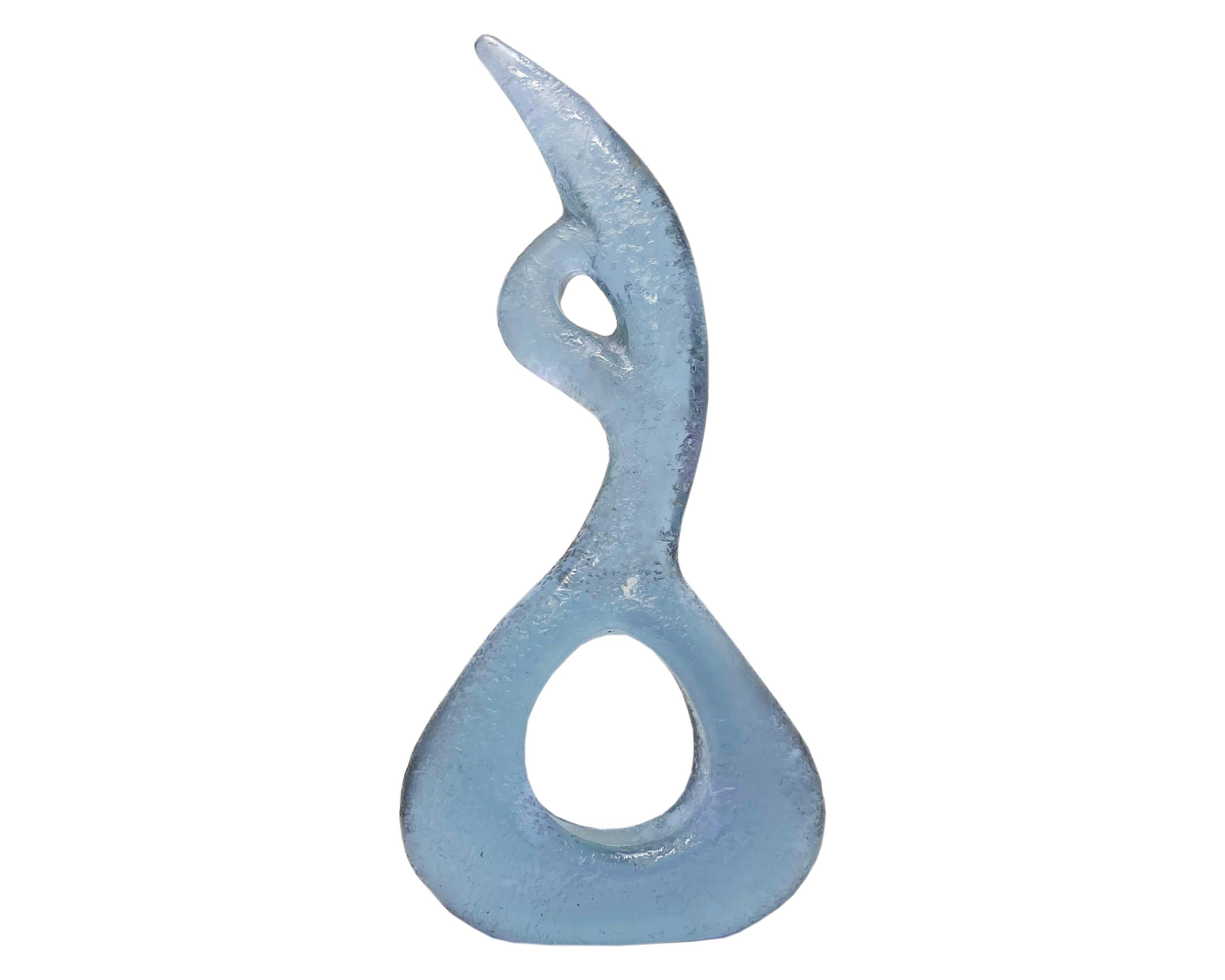 A substantial Murano art glass sculpture in Alexandrite glass by Italian glass artist Livio Seguso (born 1930). Made in Italy, the sculpture features a textured finished and displays as both a transparent aquamarine and amethyst hue depending on the
