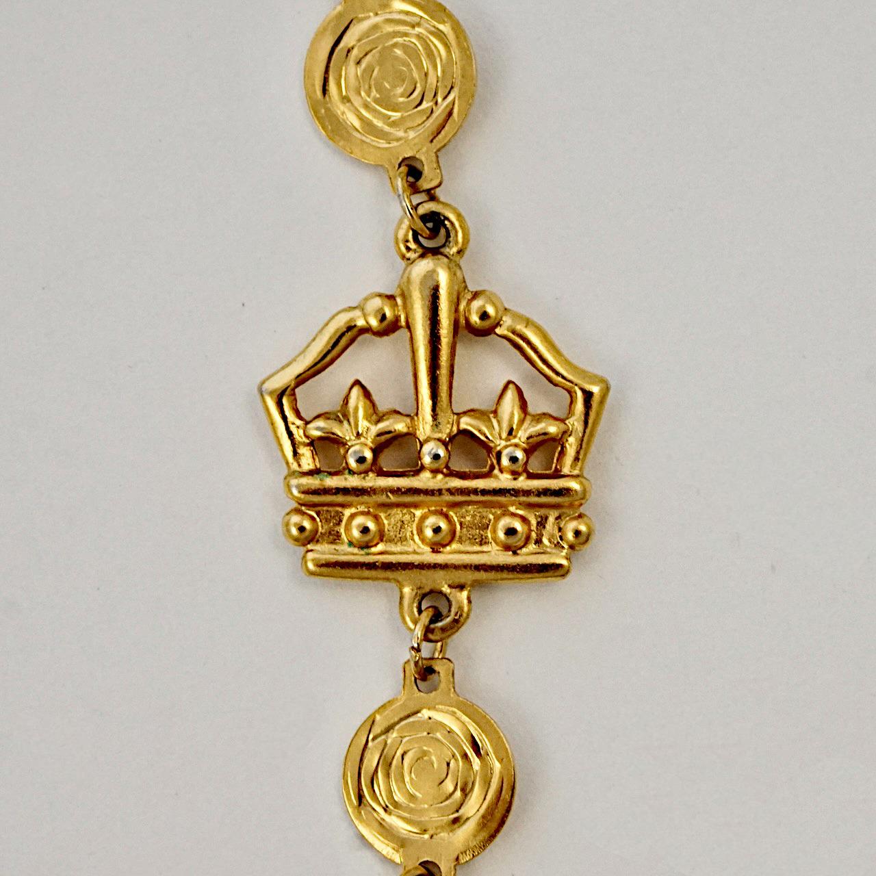 Liz Claiborne gold plated necklace with disc links and featuring crowns and lions. Measuring length 97.7cm / 38.4 inches. The necklace is in very good condition.

This is a beautiful Liz Claiborne necklace in a lovely crown and lion design. Circa