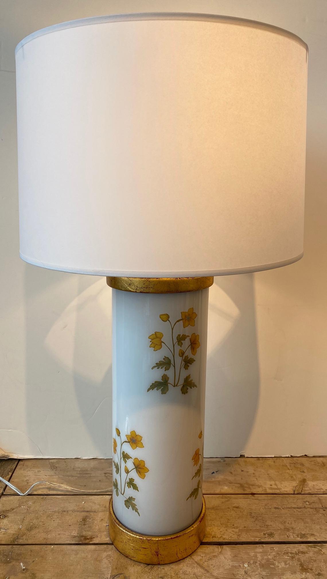 Liz Marsh designs yellow Mughal flower decoupage lamp. With hand-turned gold leaf base and cap. Handmade in USA. Brass hardware. Clear plastic cord. 17.5