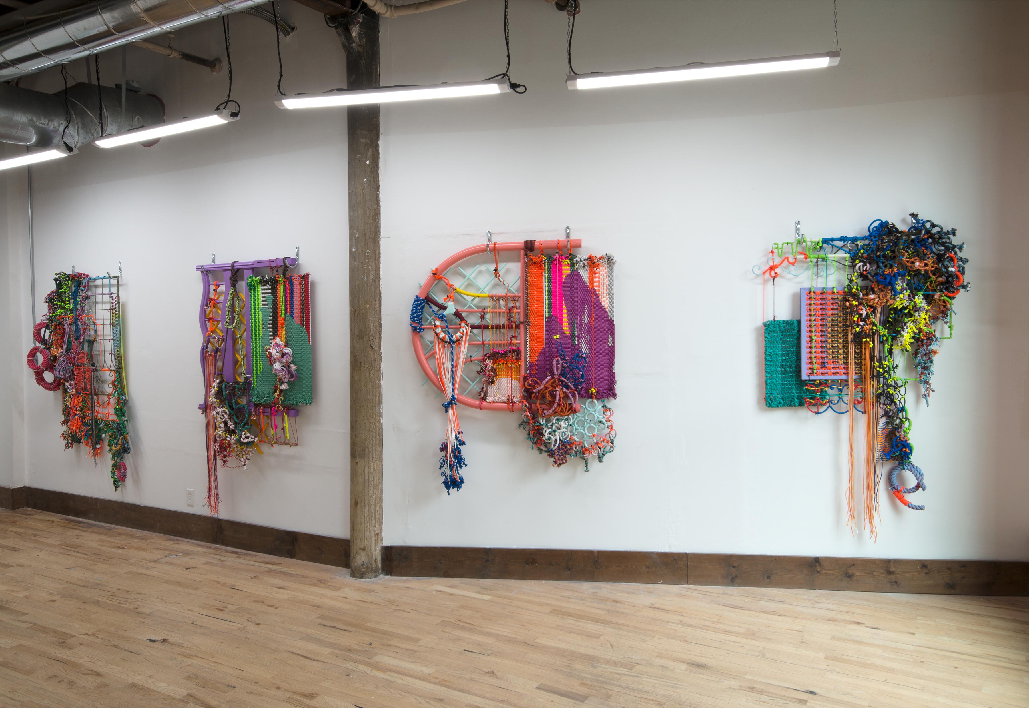In ARCHITECTURAL HYPERBOLE 02, Liz Miller creates a sculptural wall hanging piece which builds on the juxtapositions between strength and malleability, architecture and fiber, structure and knots. Building with rope onto a repurposed, highly
