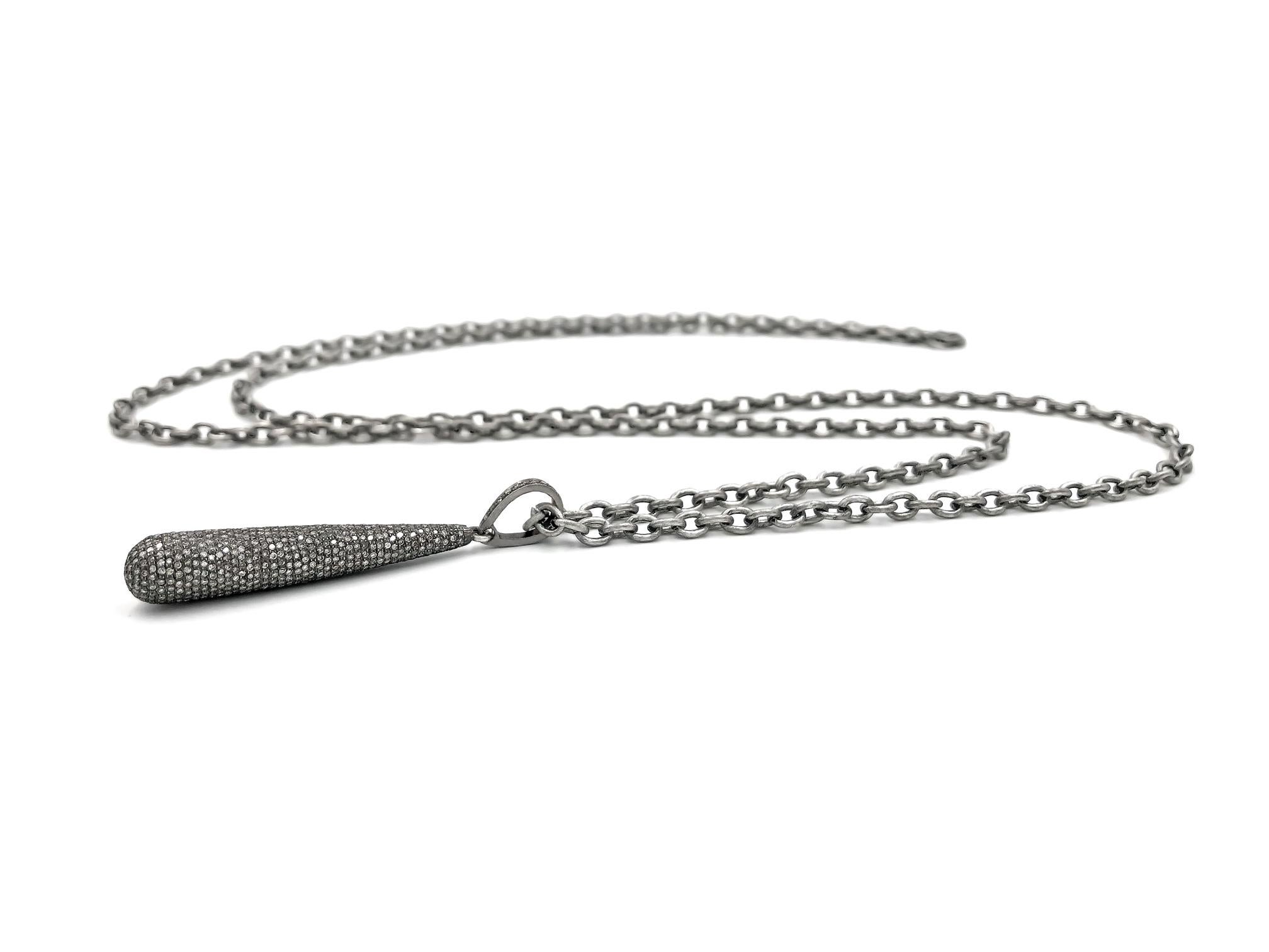 Diamond Drop Long Layering Necklace on signature stainless steel link chain featuring an oxidized sterling silver drop set with 1.70 total carats of pave' diamonds dangling from a pave' diamond bail.  36 inches in total length.

 