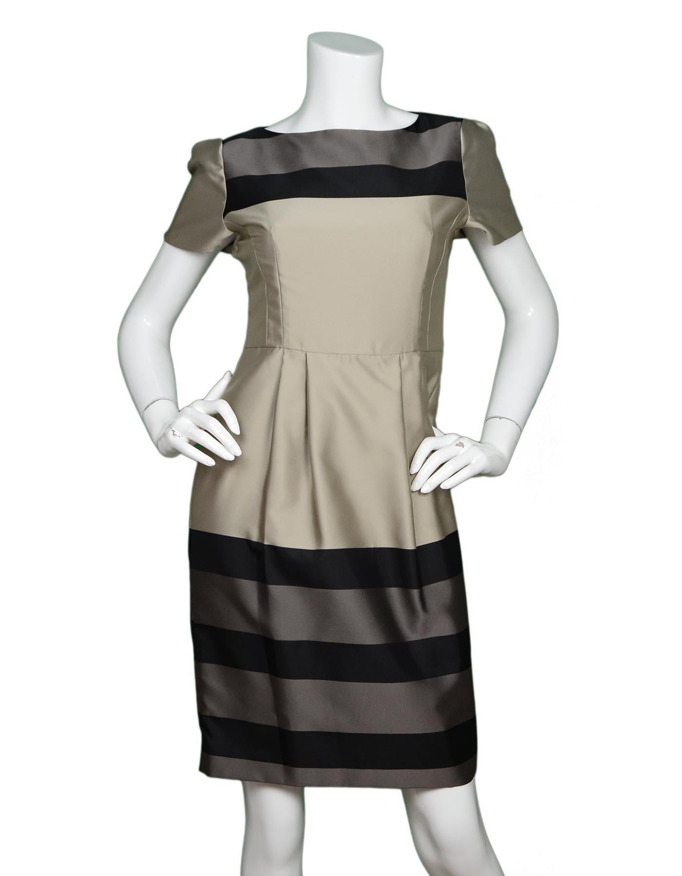 L.K. Bennett Gold/Grey/Black Stripe Shortsleeve Dress Sz 4 NWT

Made In: Romania
Color: Gold, grey, black
Materials: 100% polyester
Lining: 100% acetate 
Opening/Closure: Hidden back zipper
Overall Condition: Excellent condition with original tags