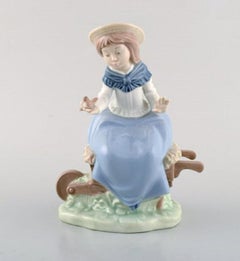 Lladro and Nao, Spain, Four Porcelain Figurines of Children, 1980s-1990s