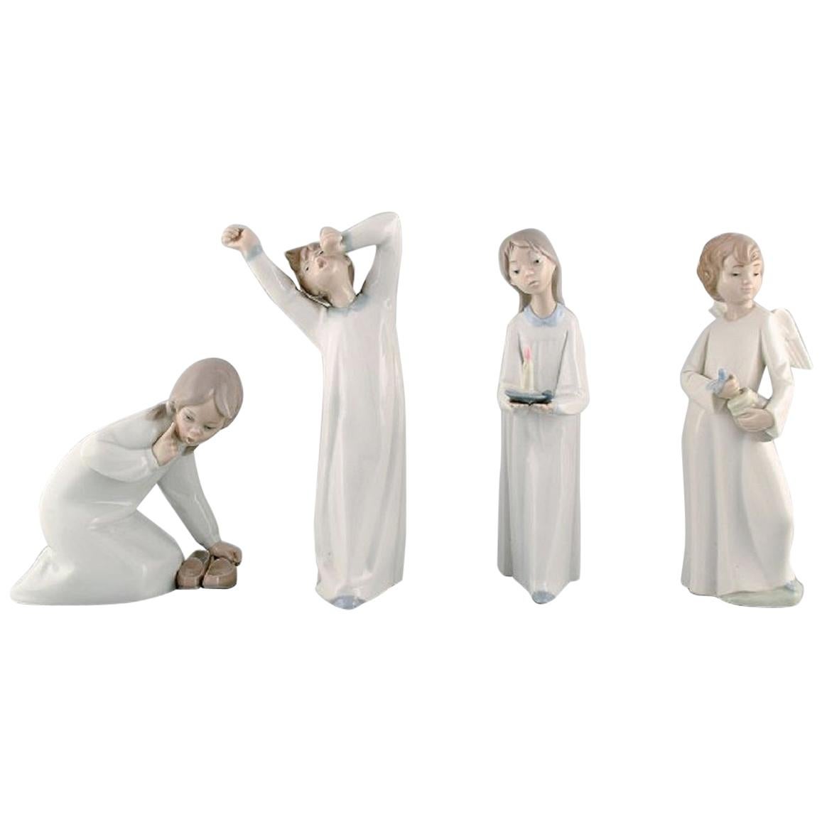Lladro and Nao, Spain, Four Porcelain Figurines of Children, 1980s-1990s