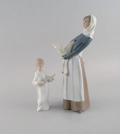 Lladro and Nao, Spain, Two Porcelain Figurines, Girl with Lamb and Angel Boy