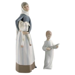 Lladro and Nao, Spain, Two Porcelain Figurines, Girl with Lamb and Angel Boy